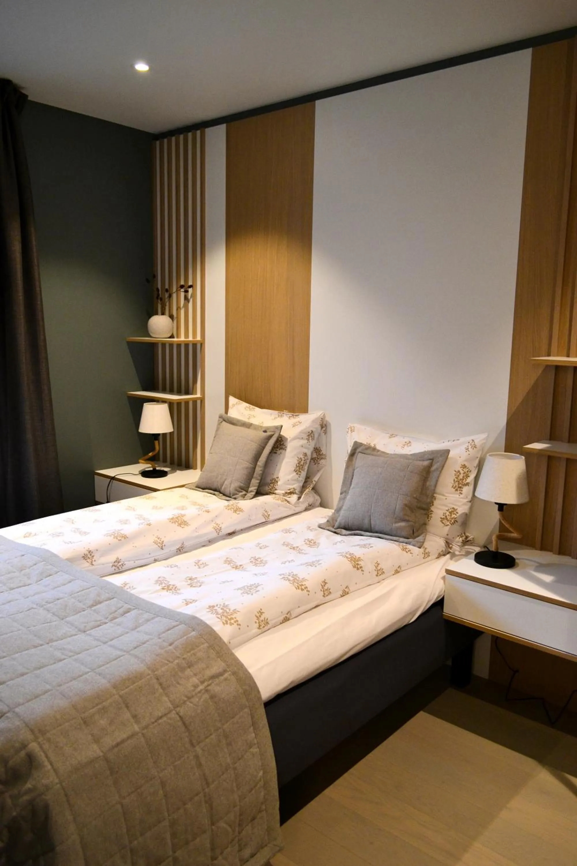 Bed in Andenes Suitehotel