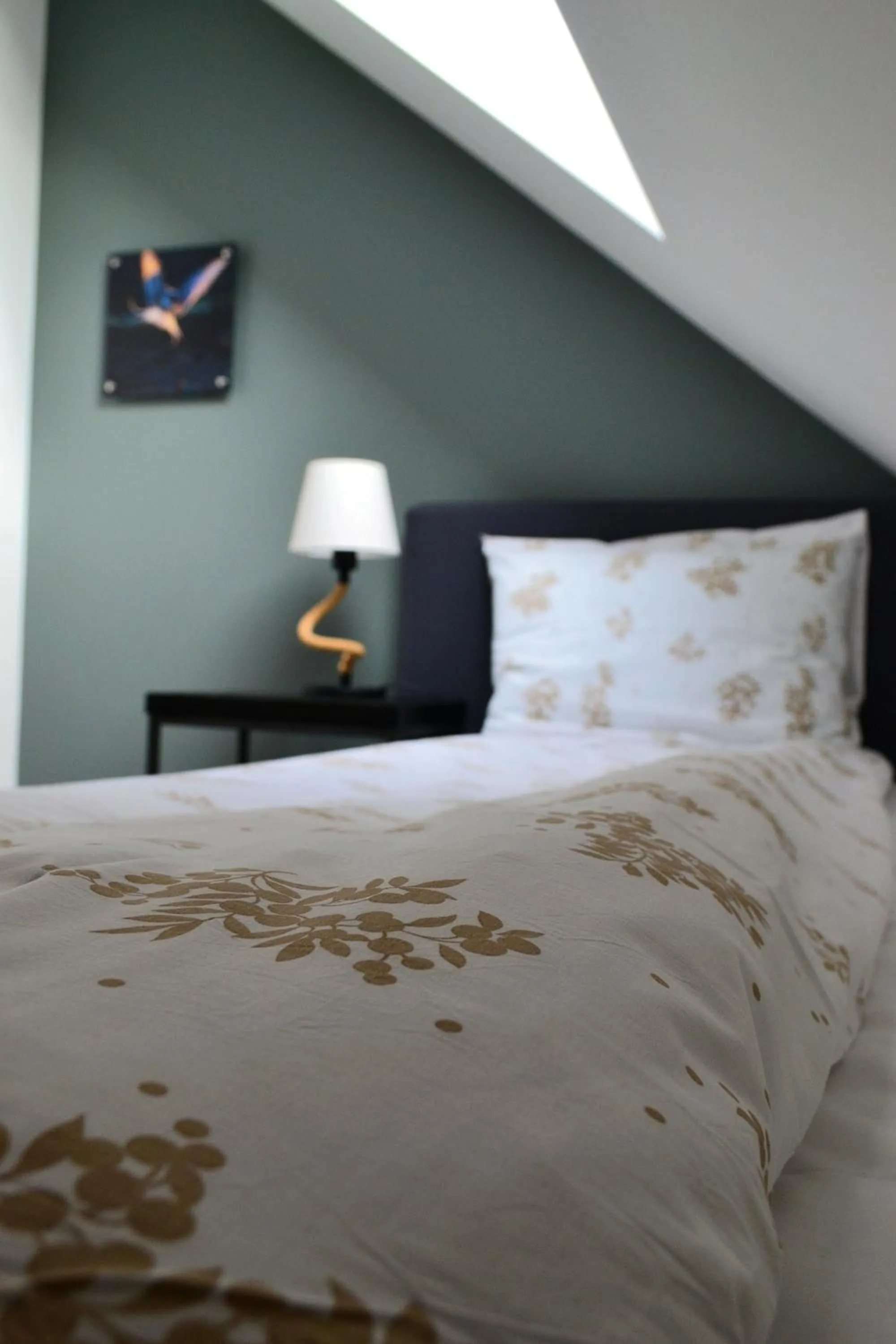 Bed in Andenes Suitehotel