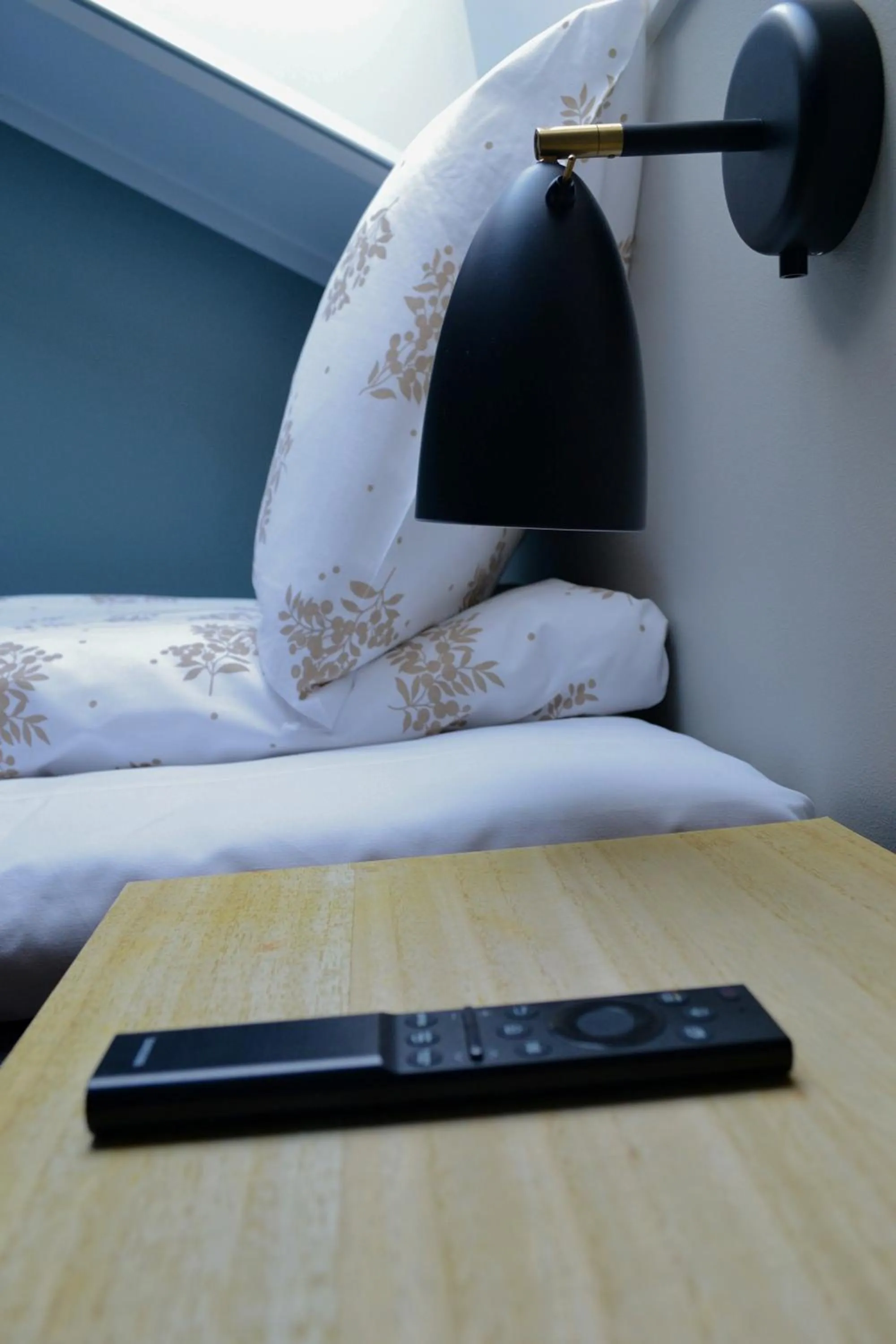 Bed in Andenes Suitehotel