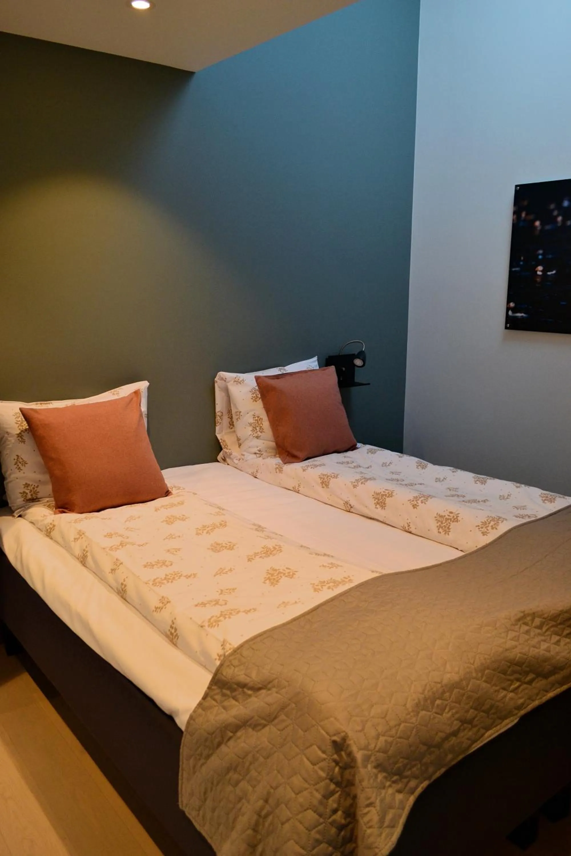 Bed in Andenes Suitehotel