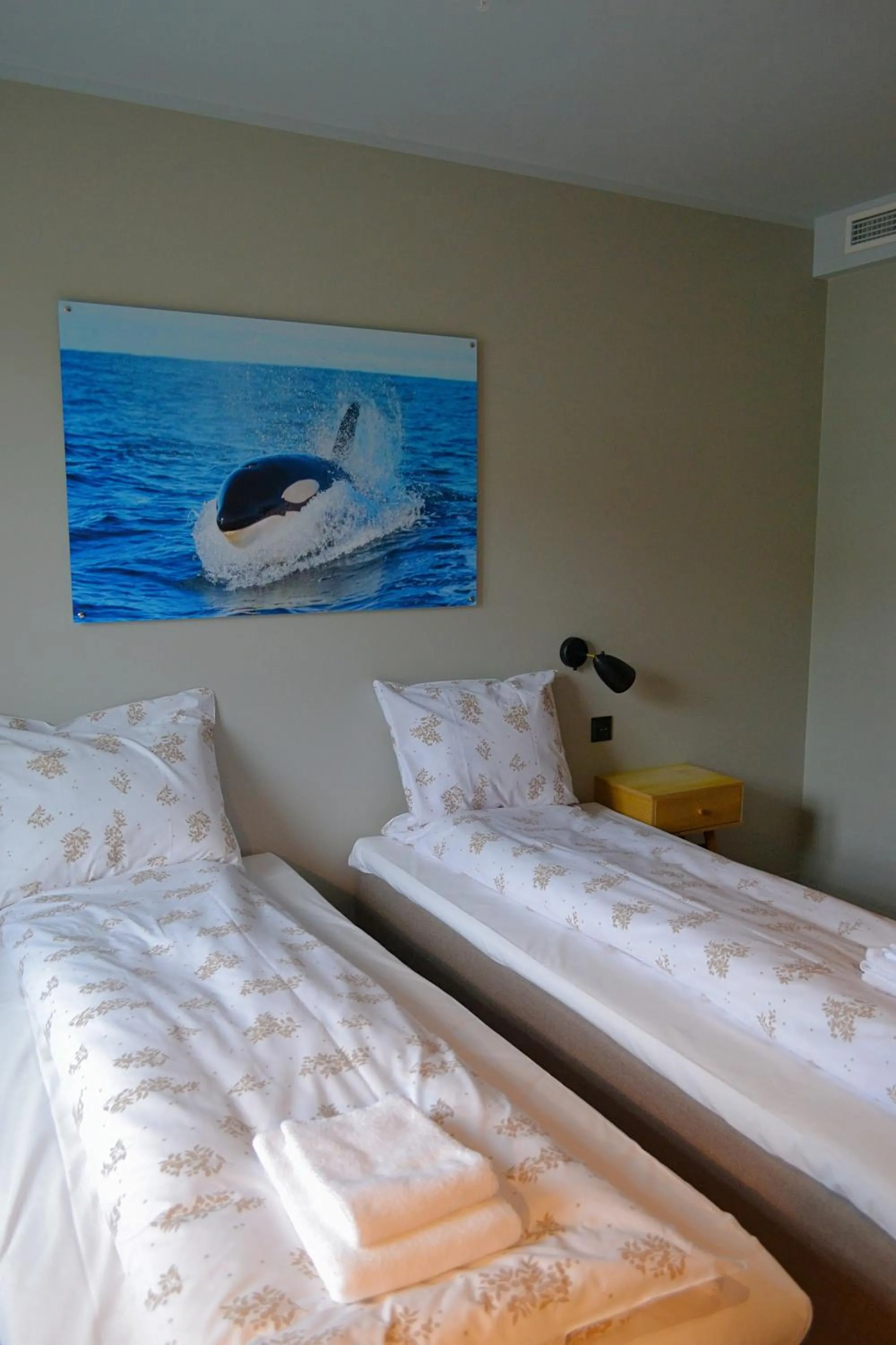 Bed in Andenes Suitehotel