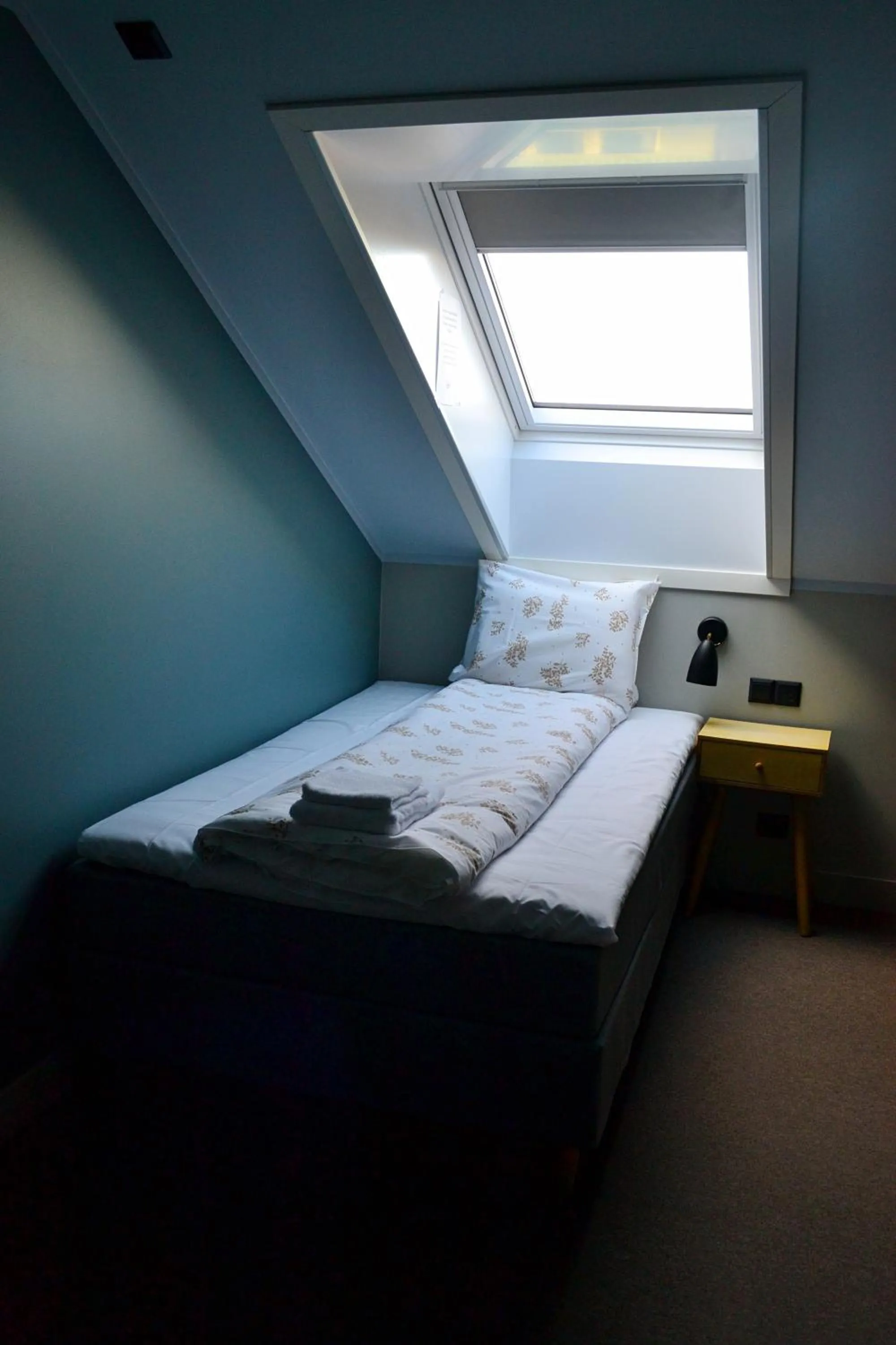 Bed in Andenes Suitehotel