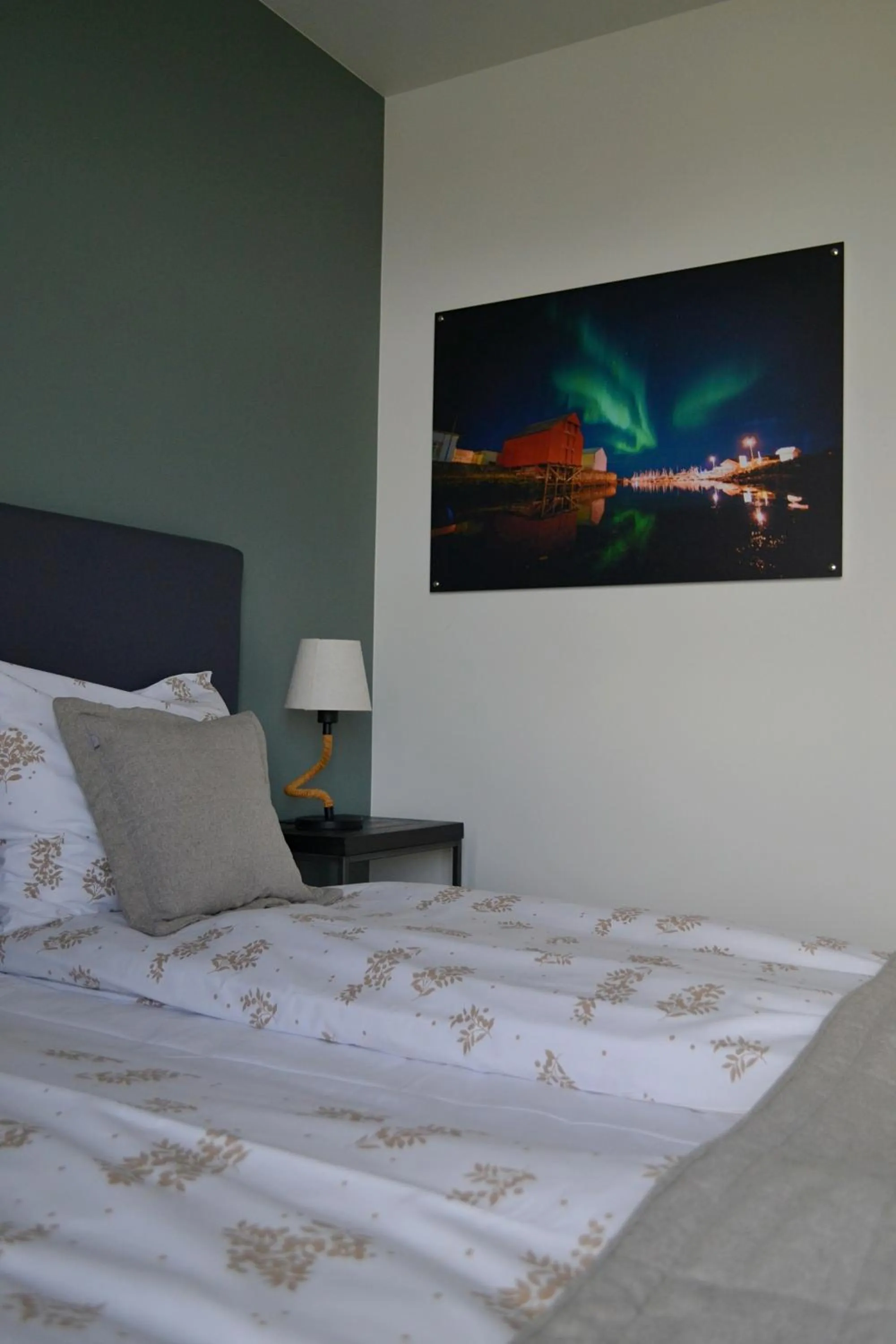 Bed in Andenes Suitehotel