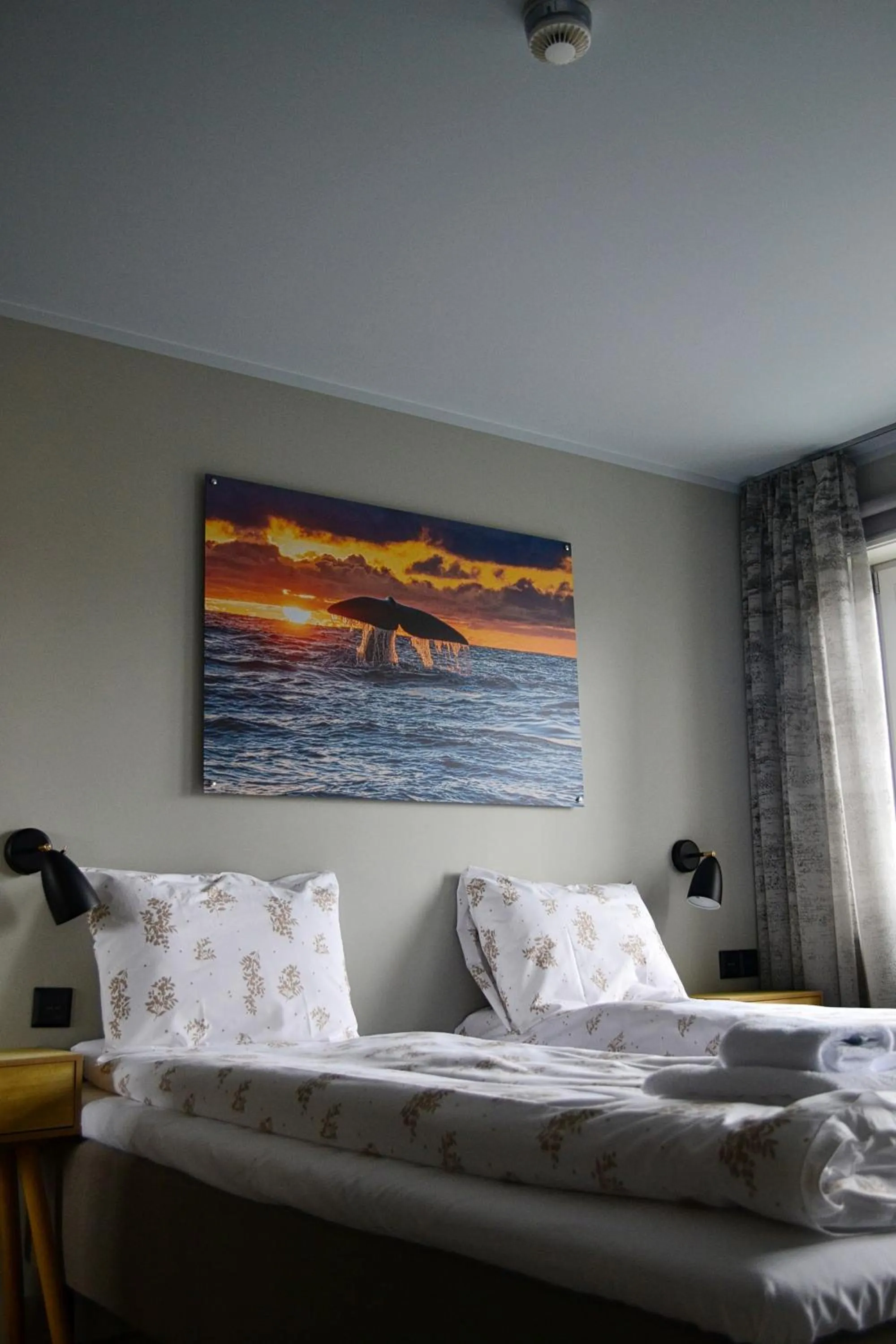 Bed in Andenes Suitehotel