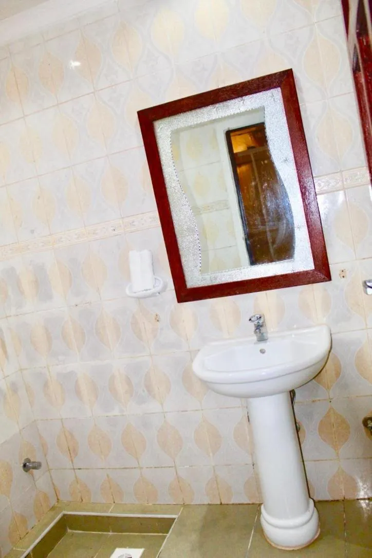 Toilet in The Island Stone Town hotel