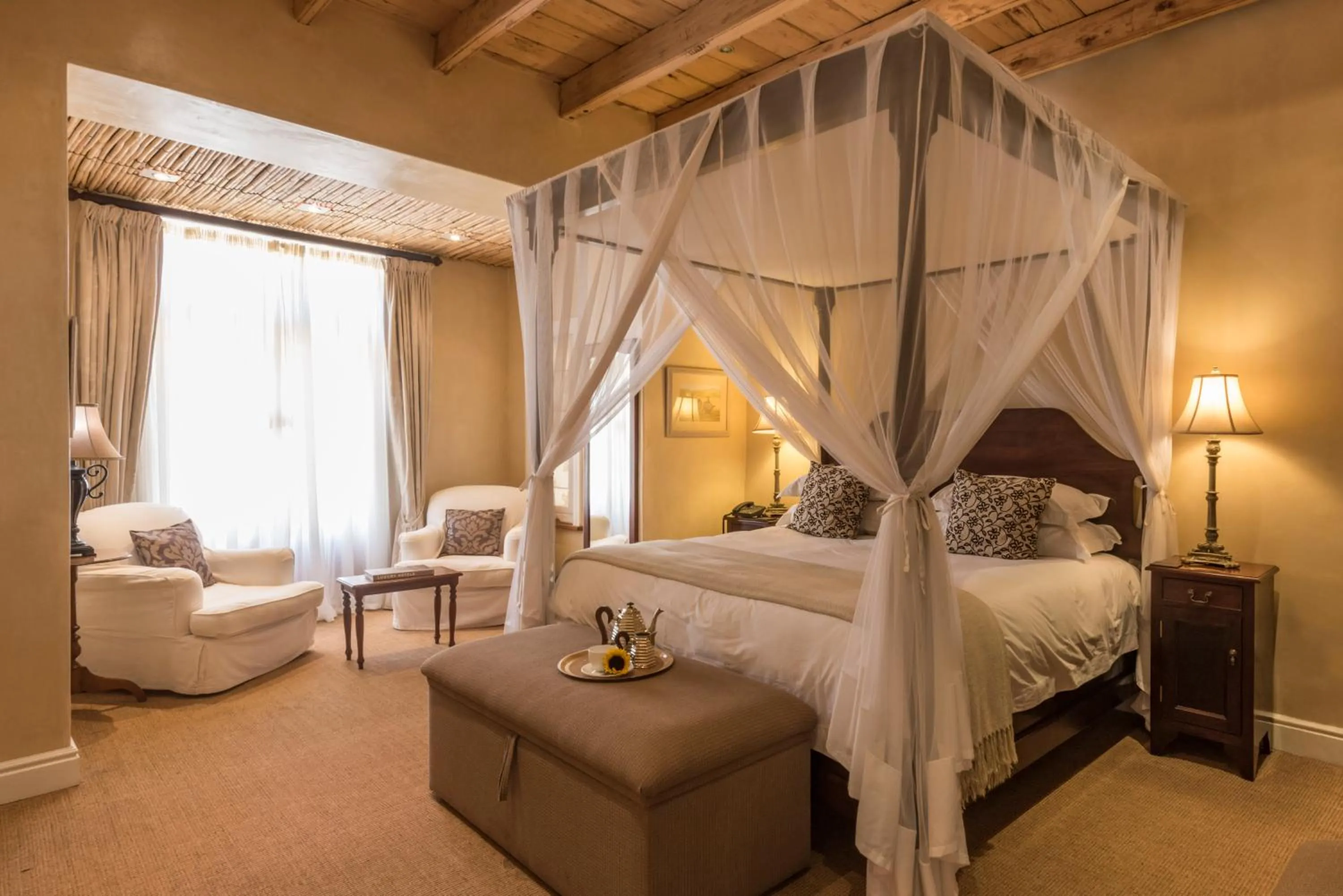 Photo of the whole room, Bed in Mount Camdeboo Private Game Reserve by NEWMARK