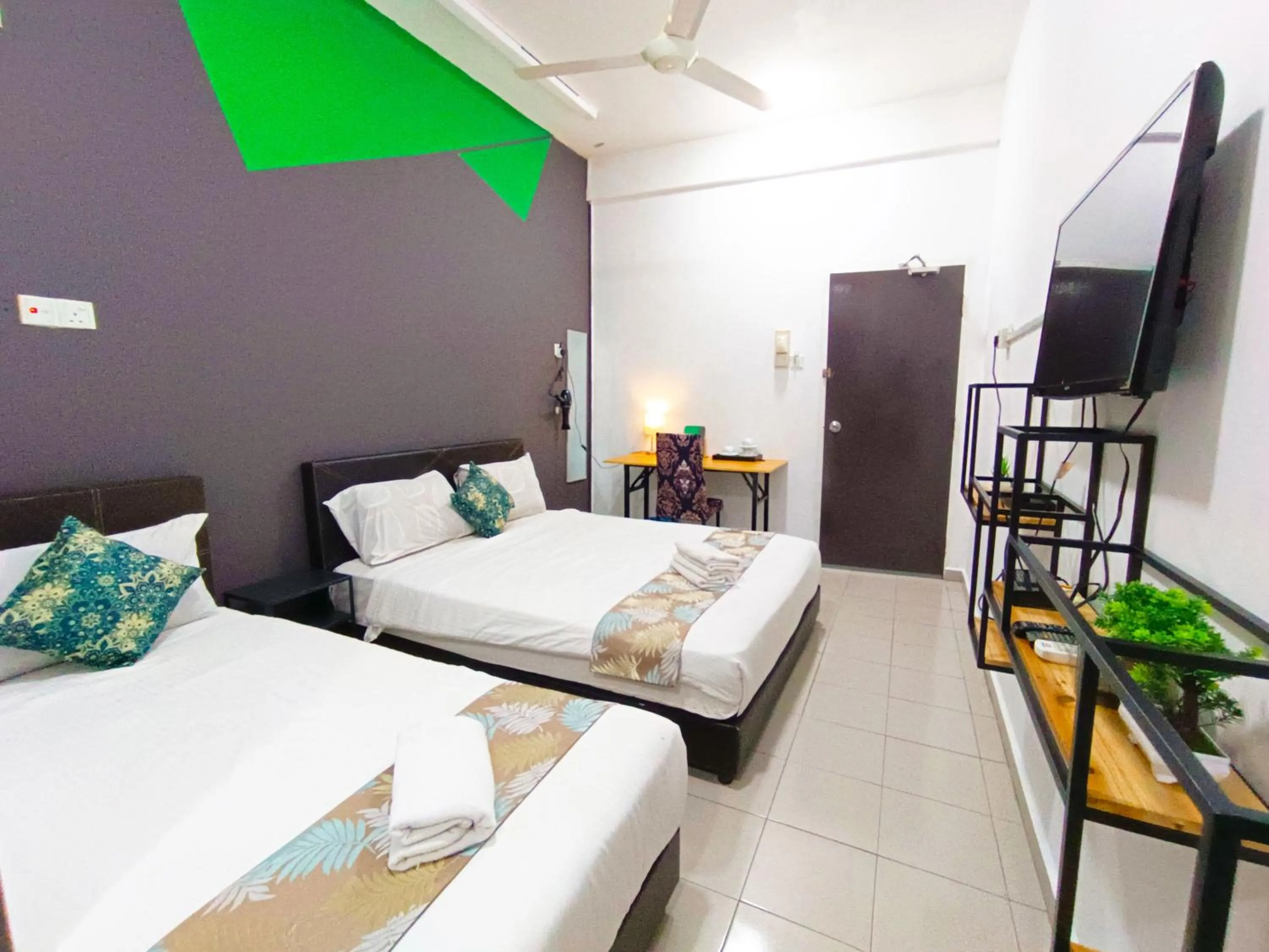 Bed in Salaam Suites Hotel