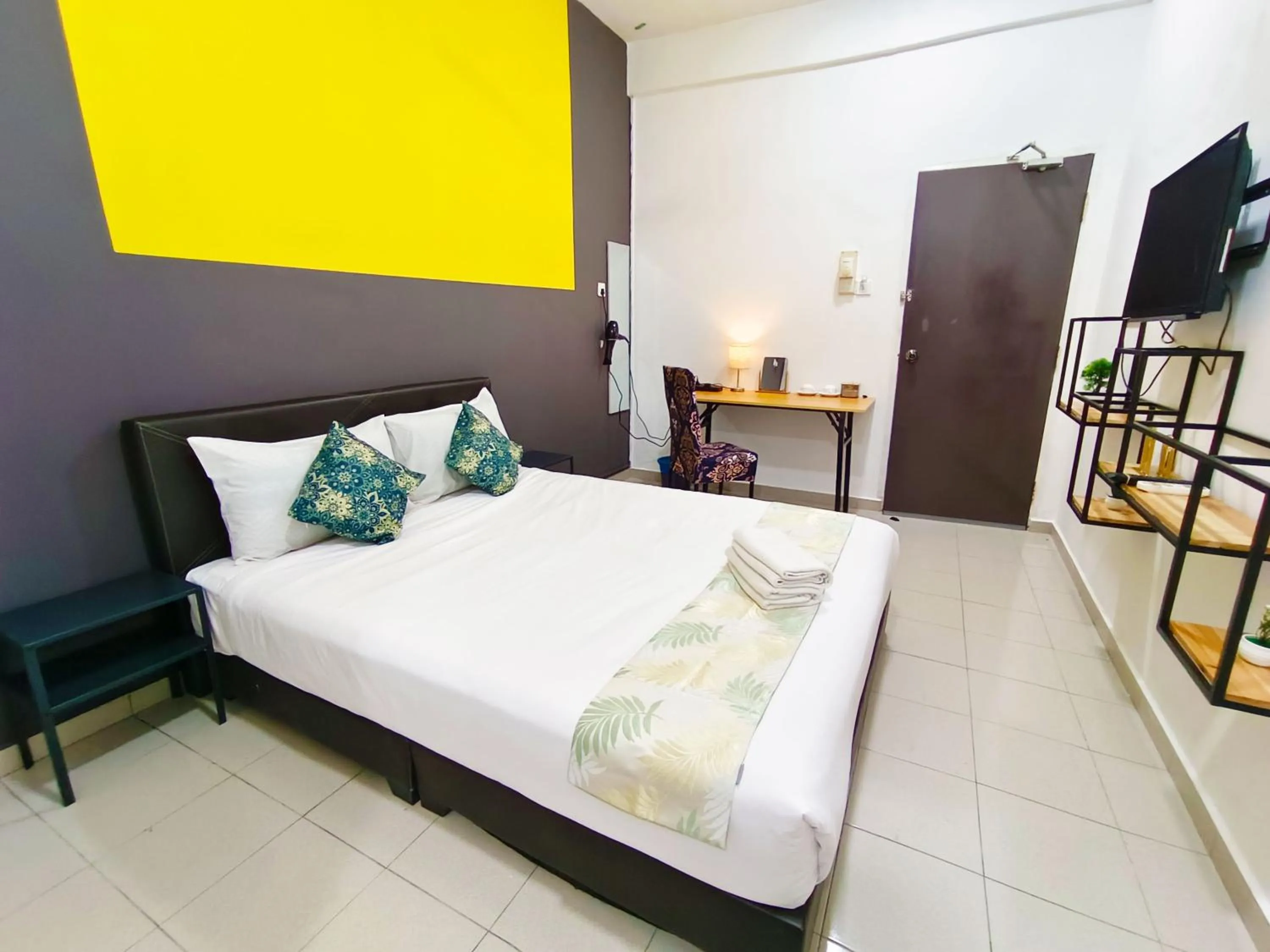 Bed in Salaam Suites Hotel