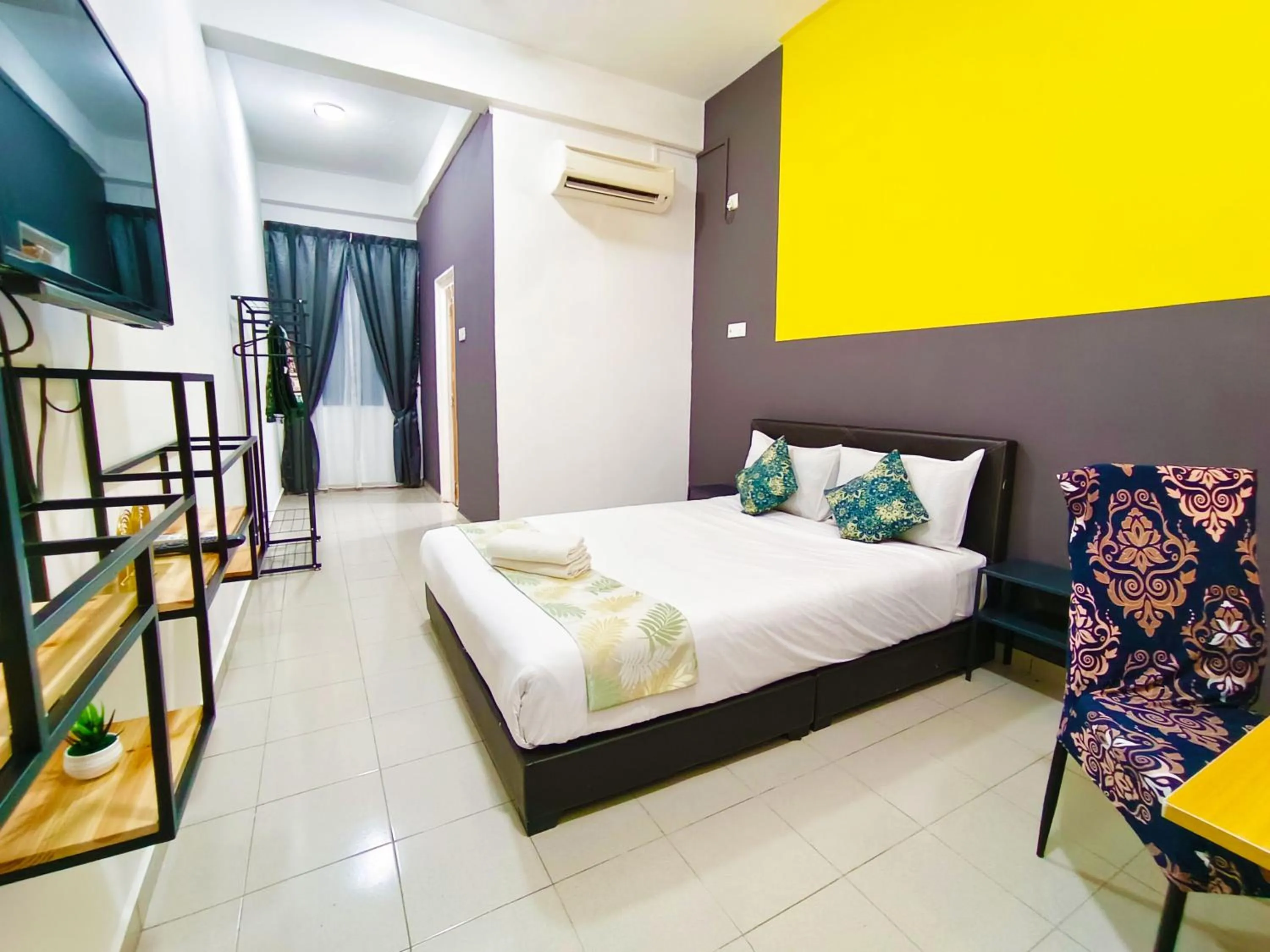 Bed in Salaam Suites Hotel