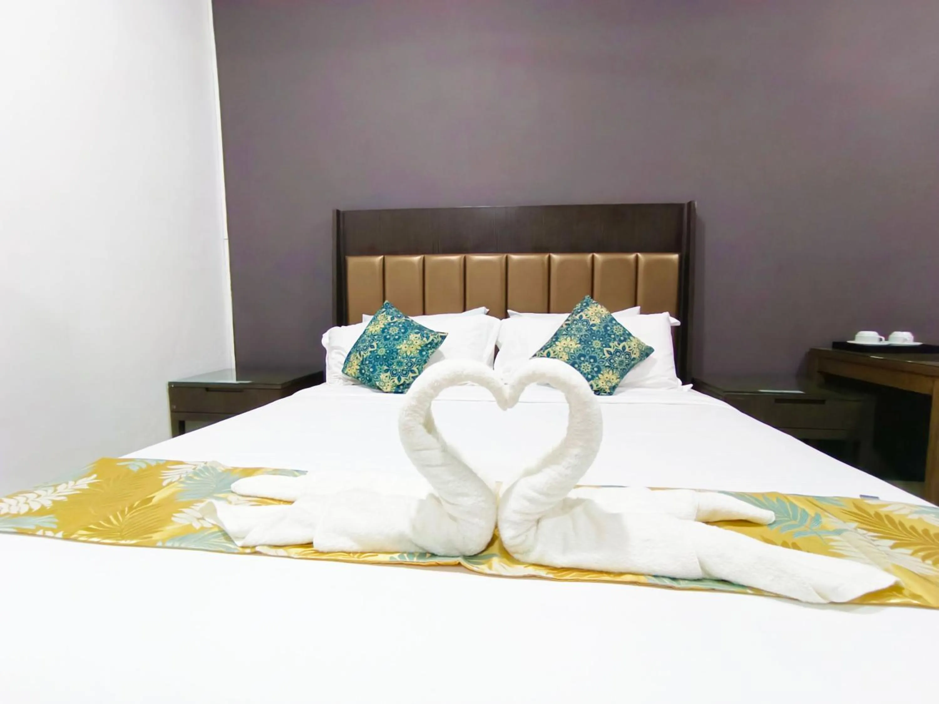 Bed in Salaam Suites Hotel