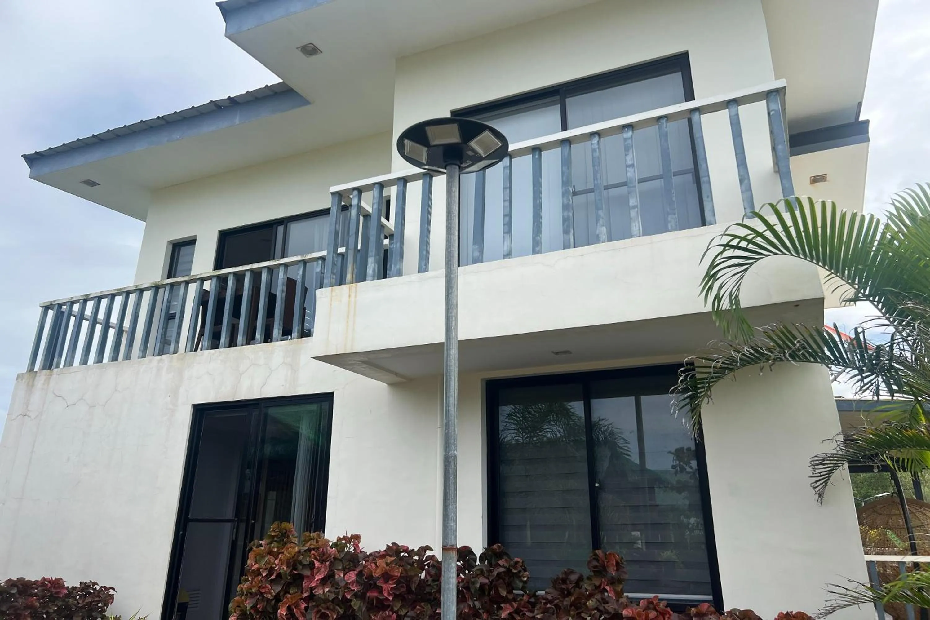 Bedroom in Lover's Point Beach Front Resort