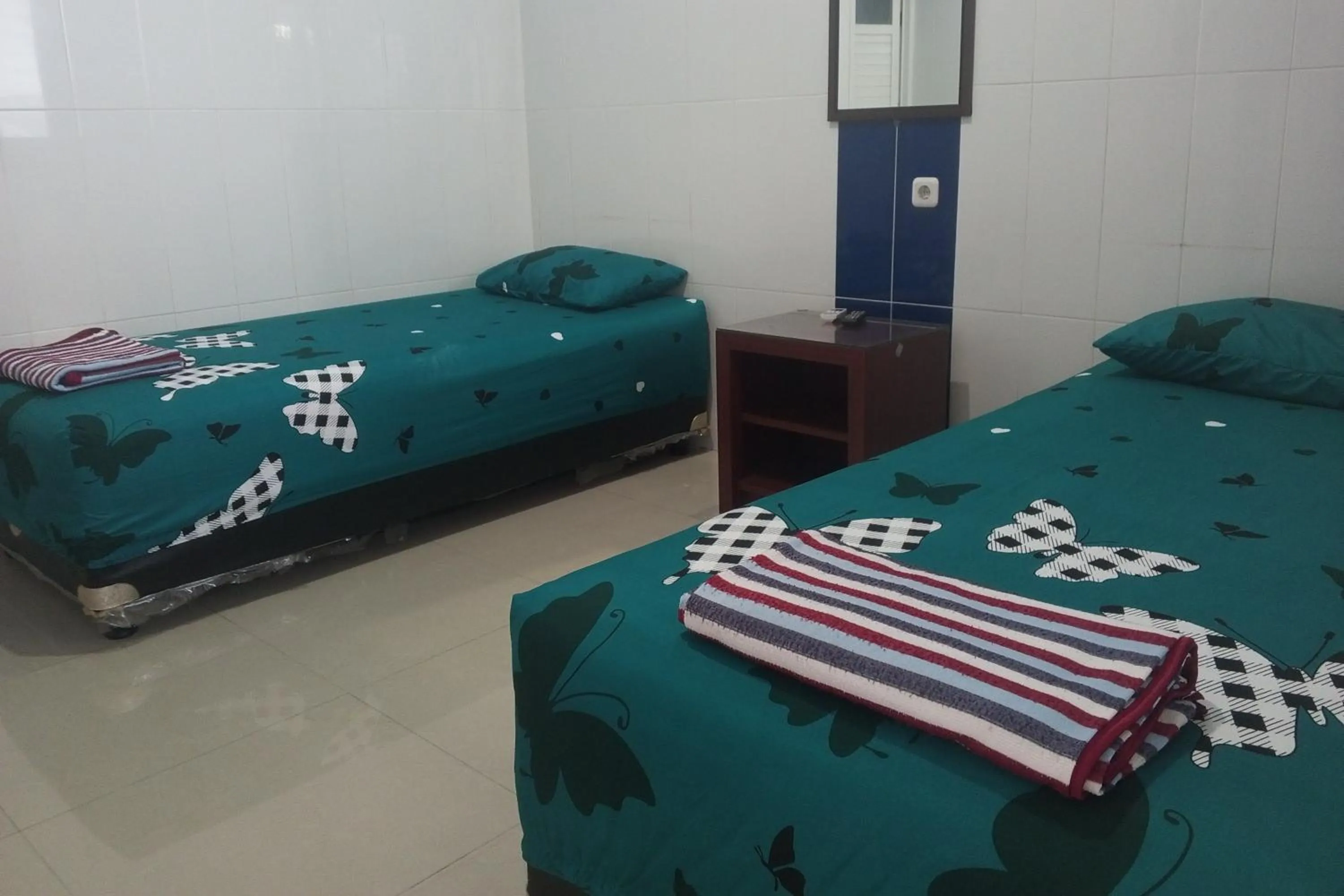 Bedroom in Hotel Orchid Syariah