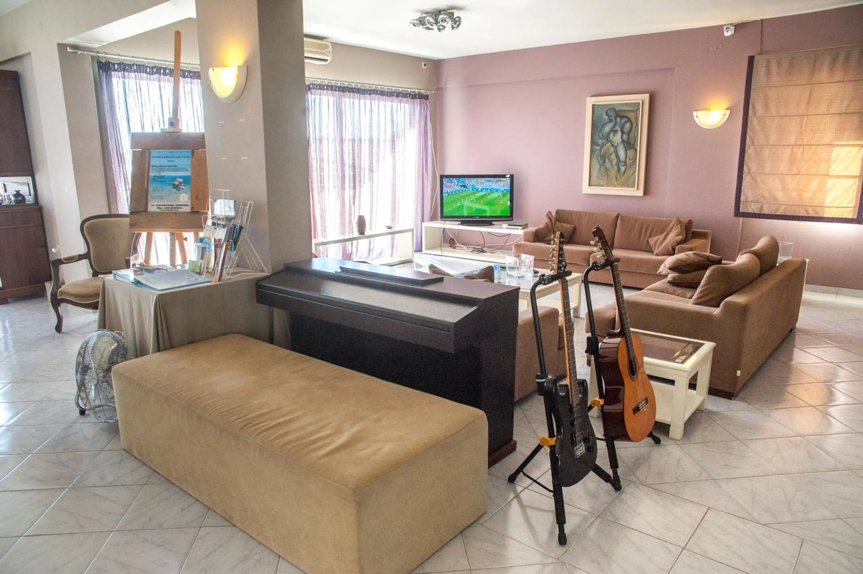 Communal lounge/ TV room in Mouikis Sun Village