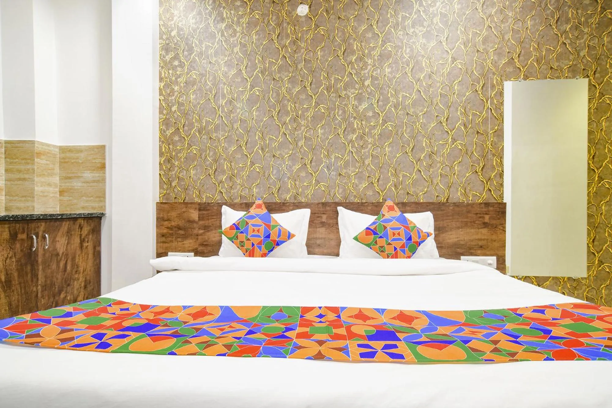 Bed in FabHotel Sage Residency