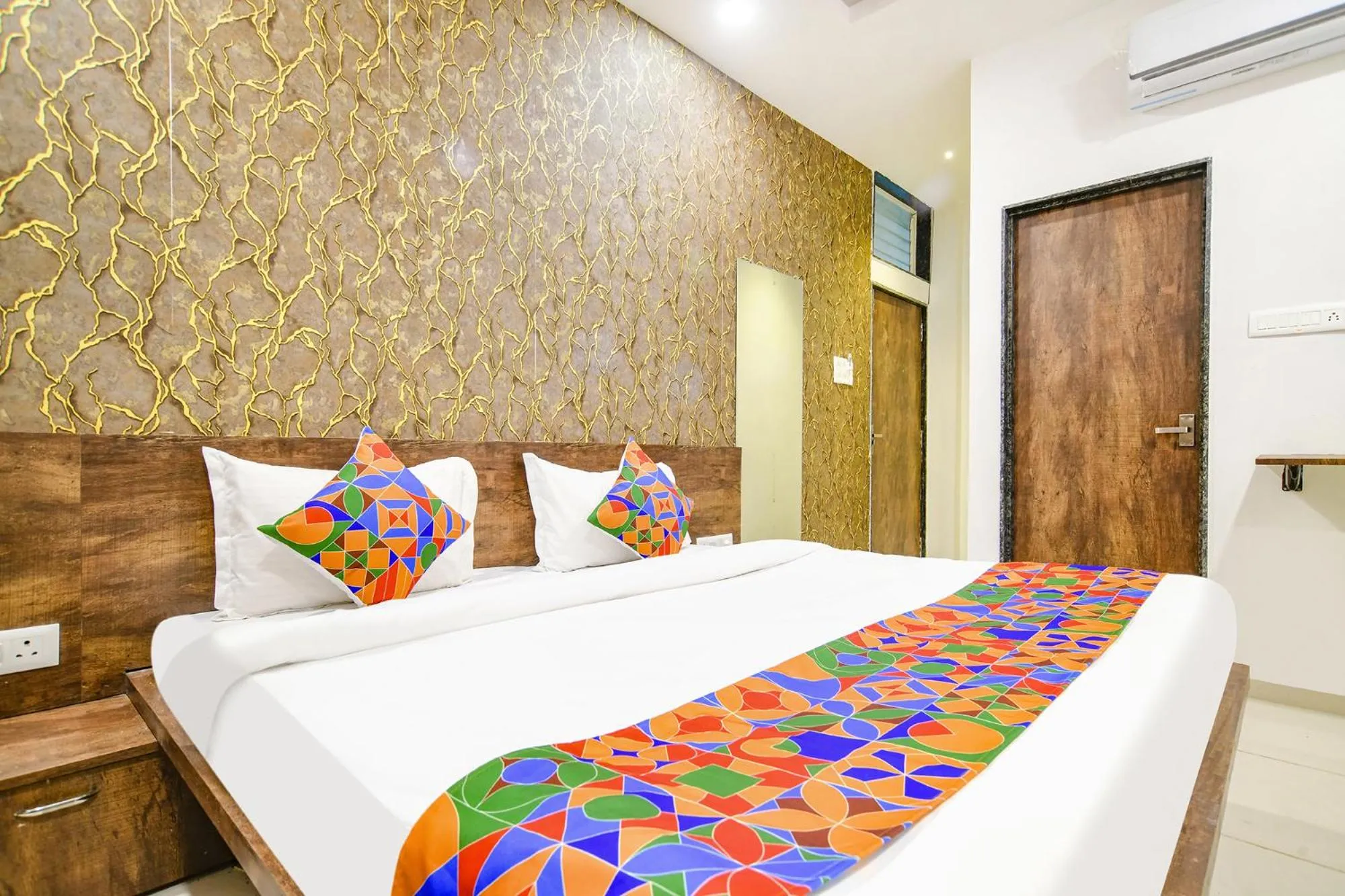 Bed in FabHotel Sage Residency