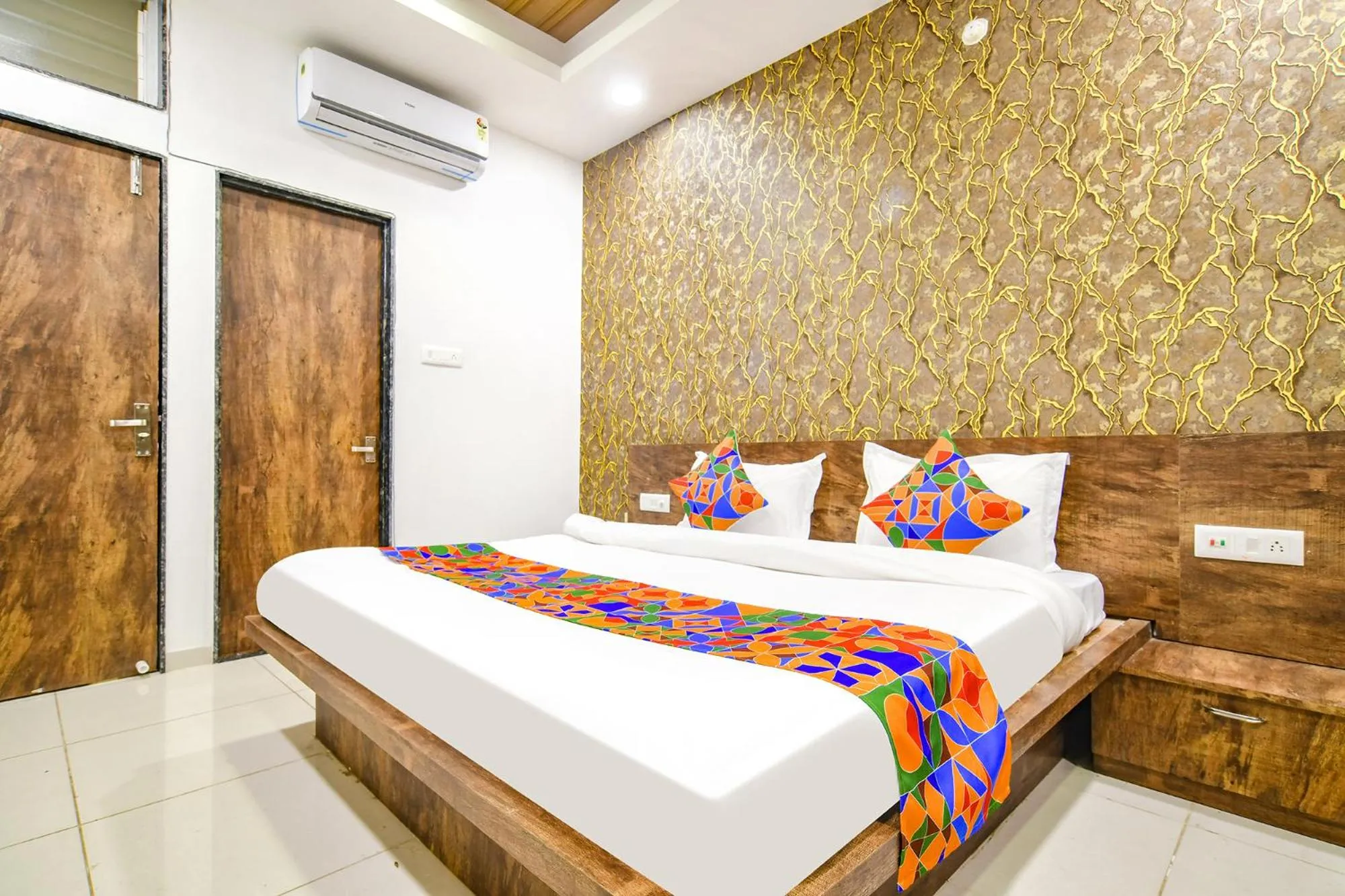 Bed in FabHotel Sage Residency