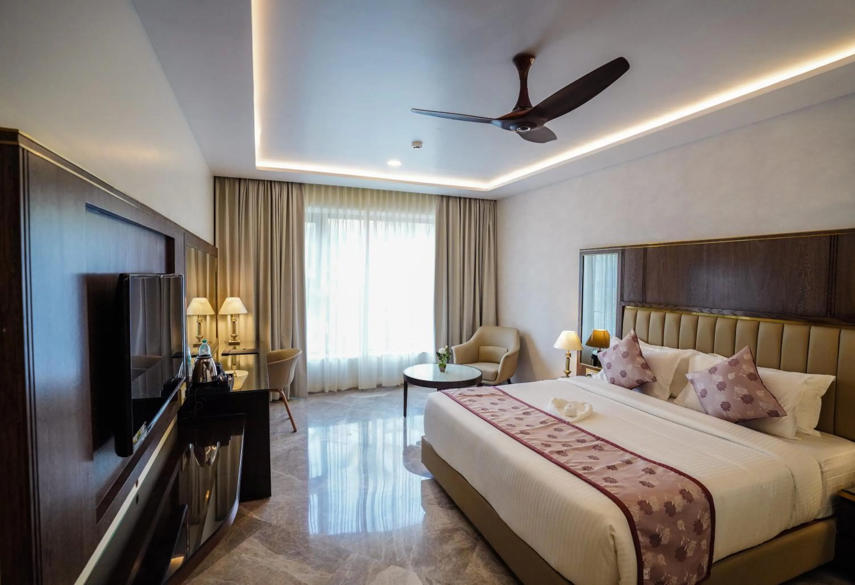 Photo of the whole room, Bed in UVA MANISH