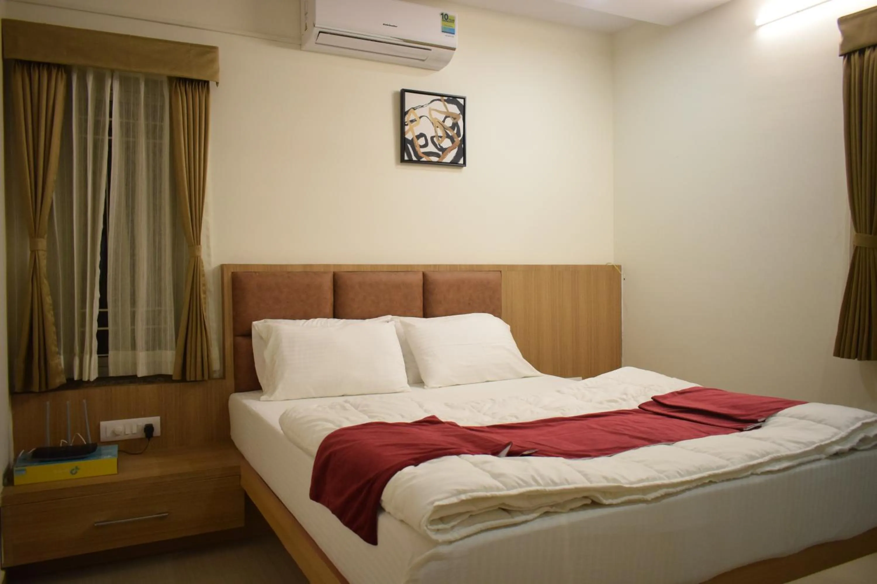 Bed in Sunlight Serviced Apartments