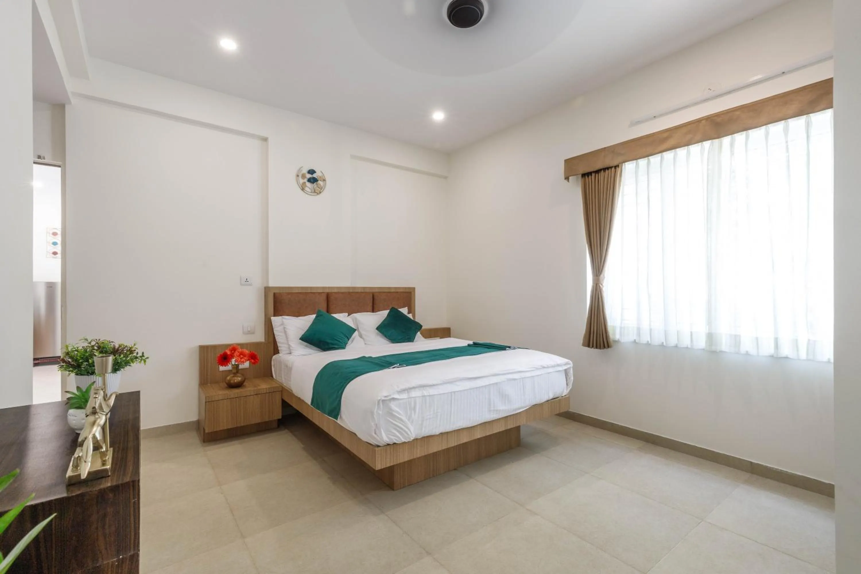 Bed in Sunlight Serviced Apartments