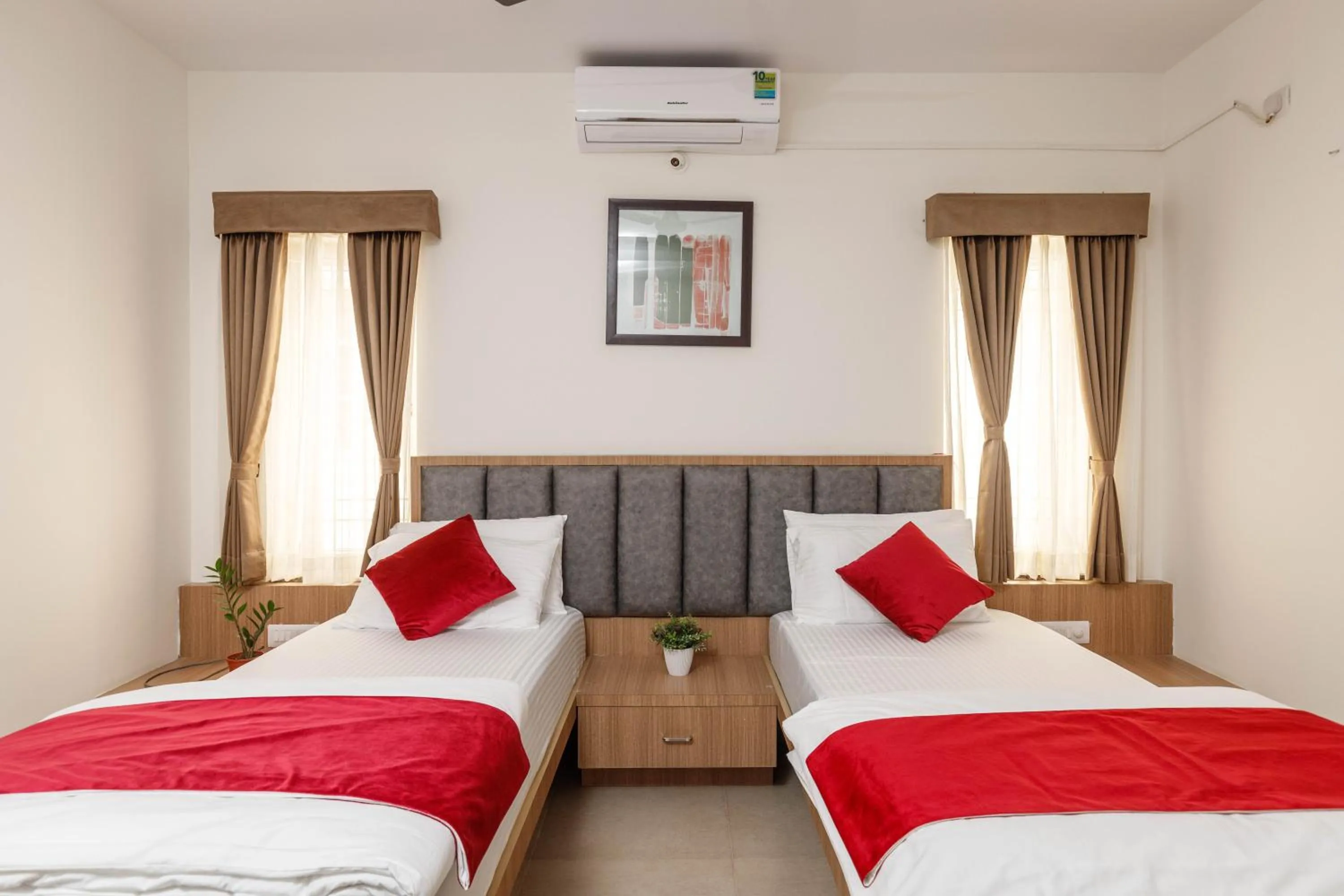 Bed in Sunlight Serviced Apartments