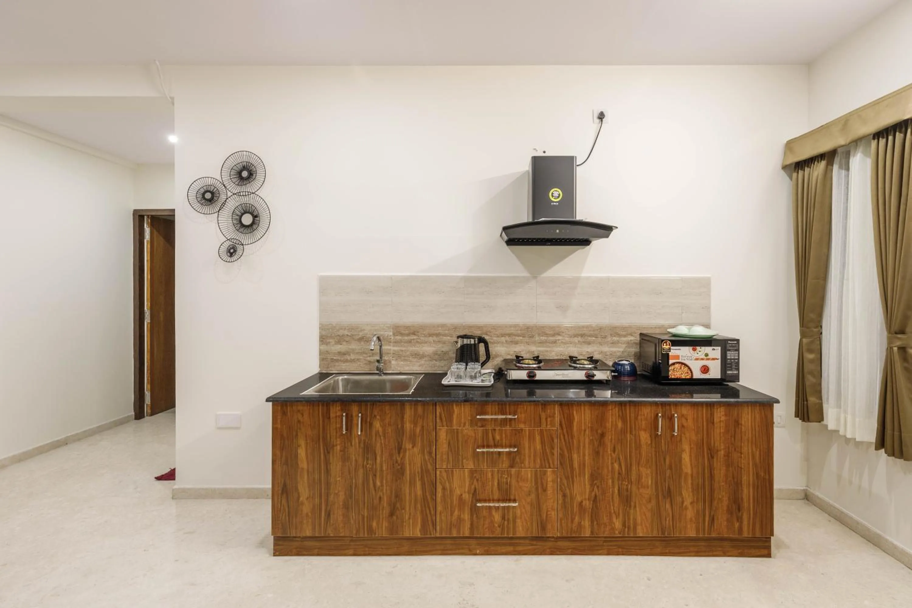 Kitchen or kitchenette in Sunlight Serviced Apartments