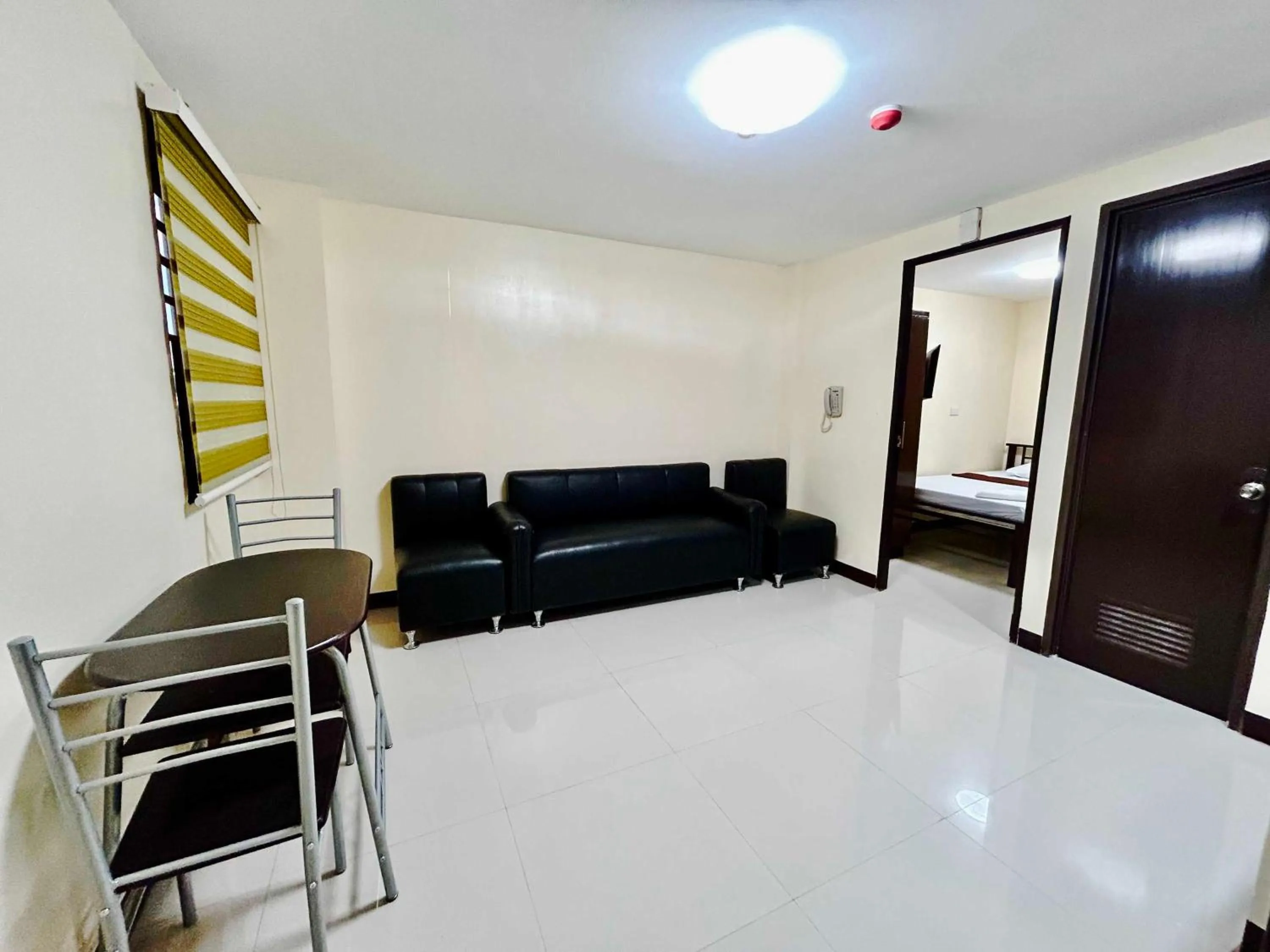 Bedroom in OYO 1045 Rayjan Apartelle