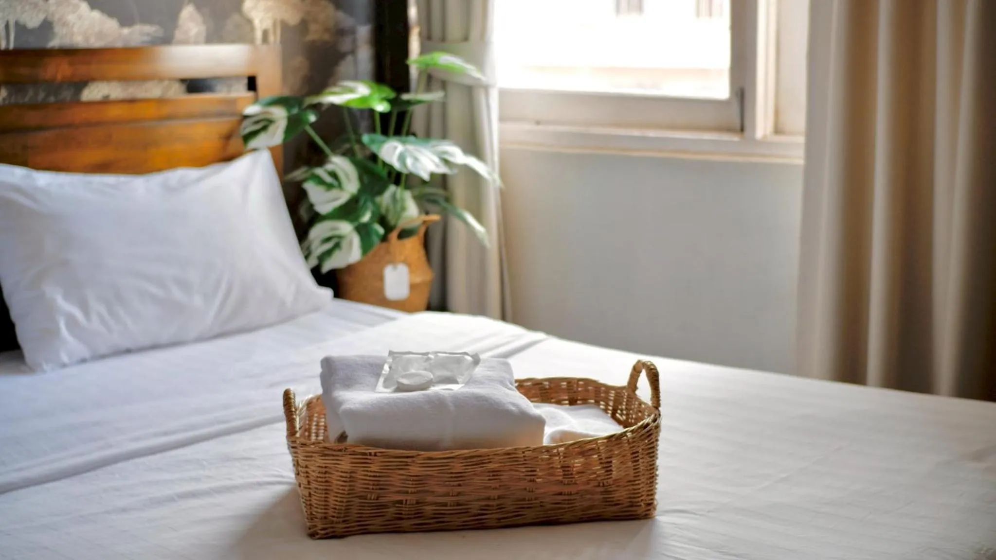 Bed in Delio Boutique Hotel