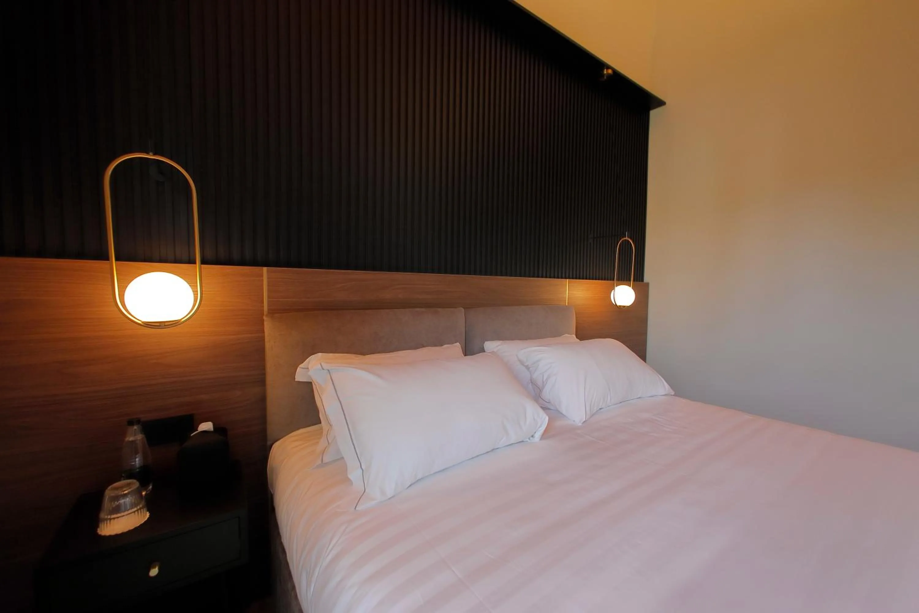 Bed in Hotel Namia by Dori