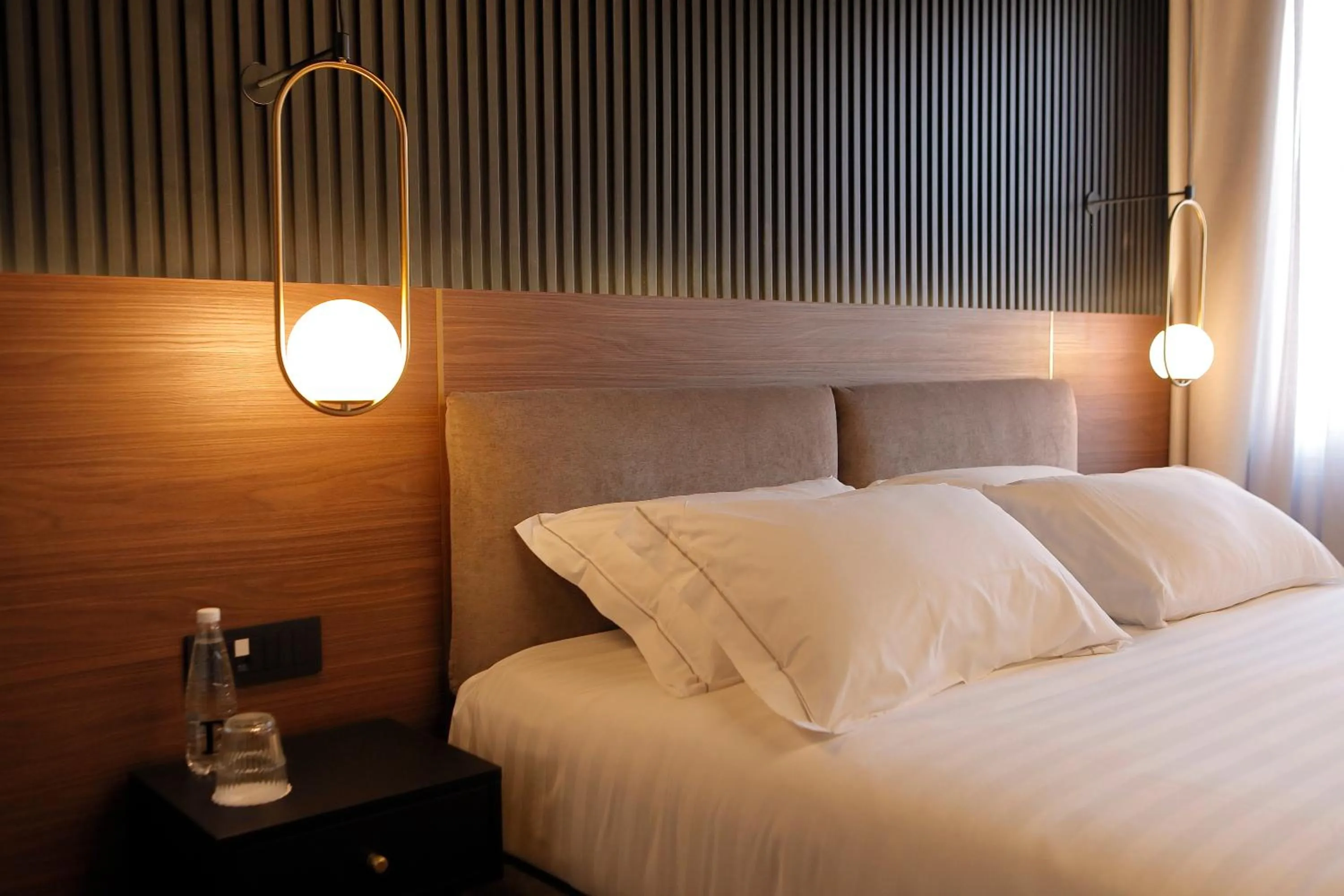 Bed in Hotel Namia by Dori