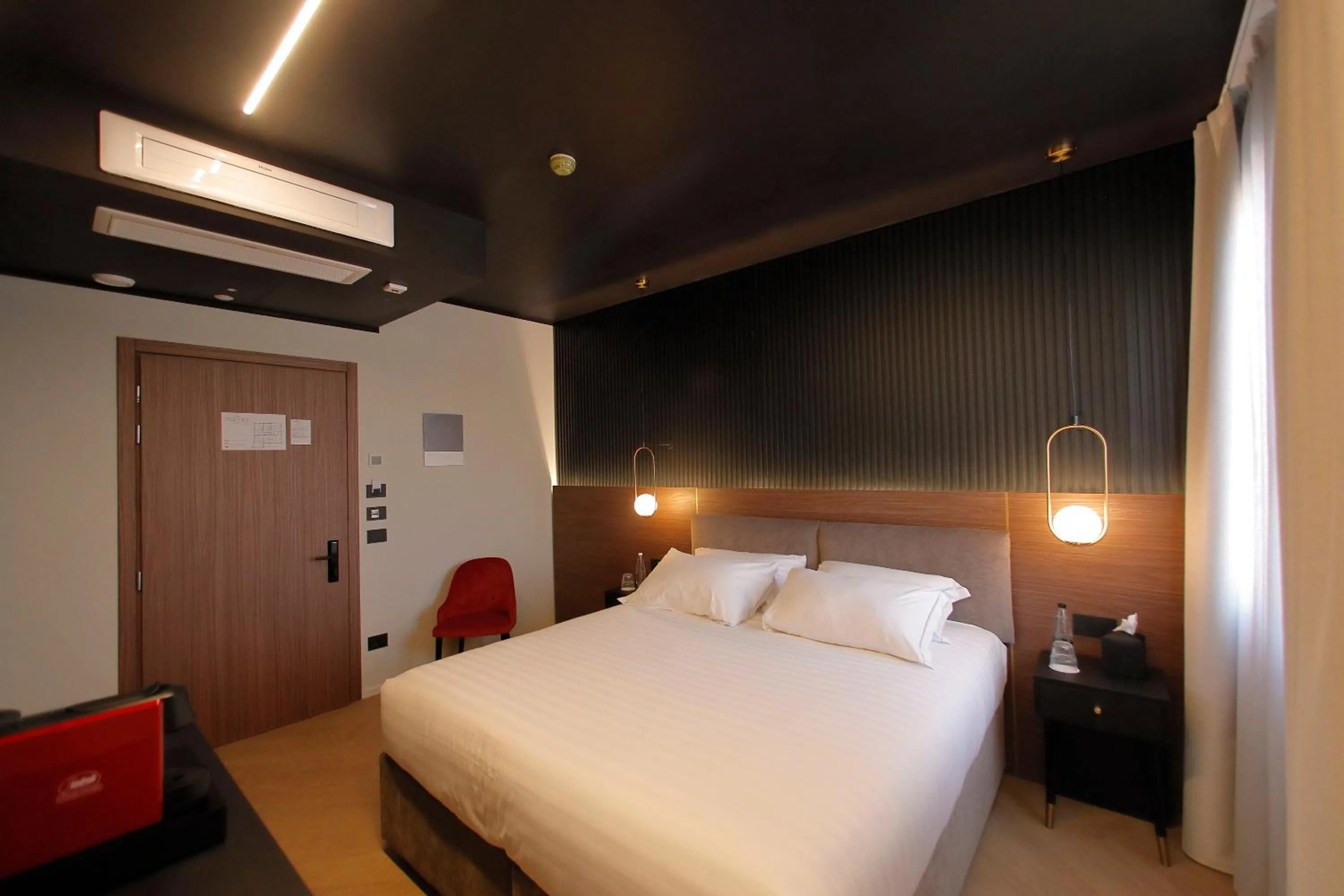 Bed in Hotel Namia by Dori