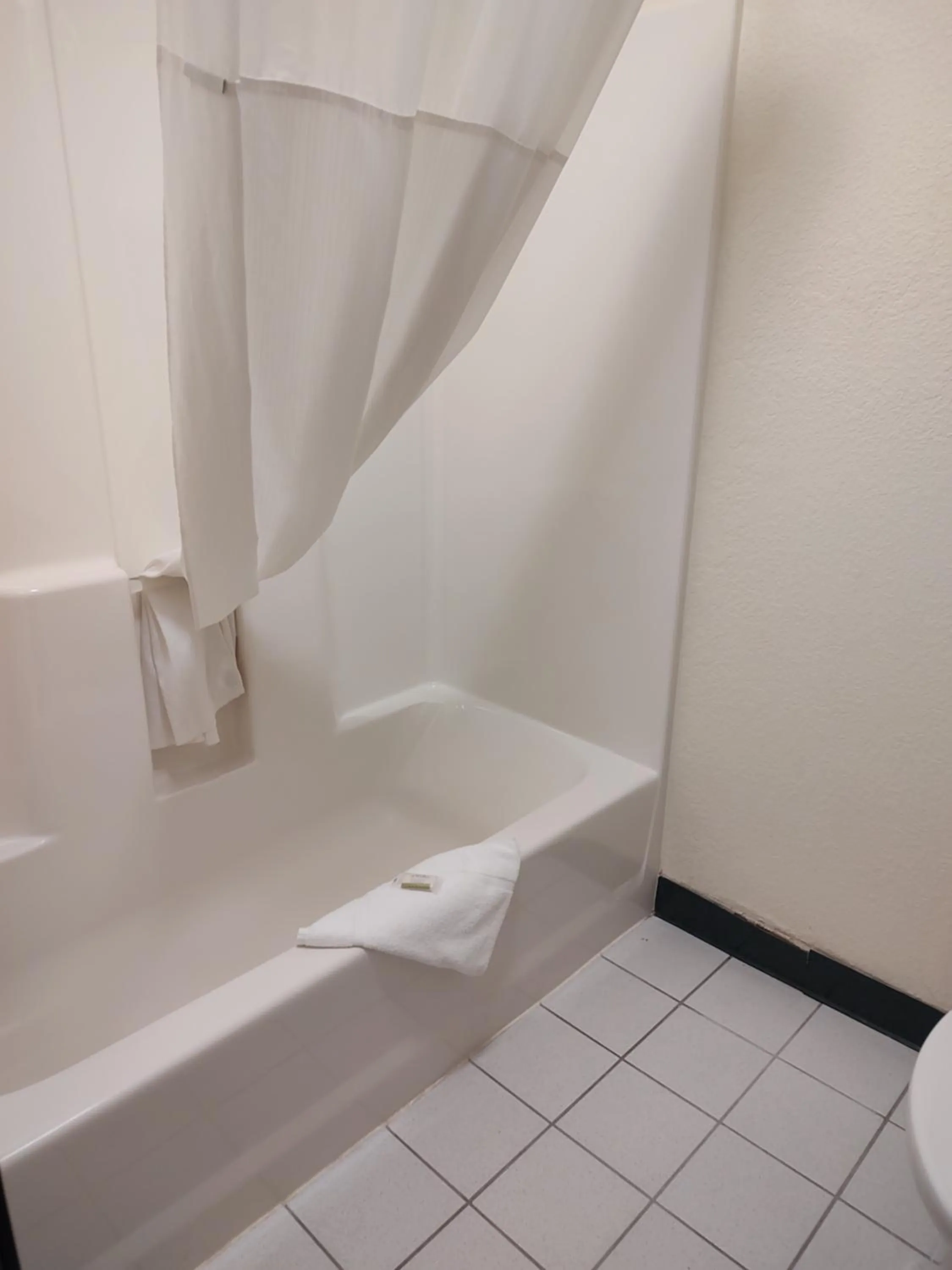 Bathroom in Days Inn & Suites by Wyndham Fargo 19th Ave/Airport Dome