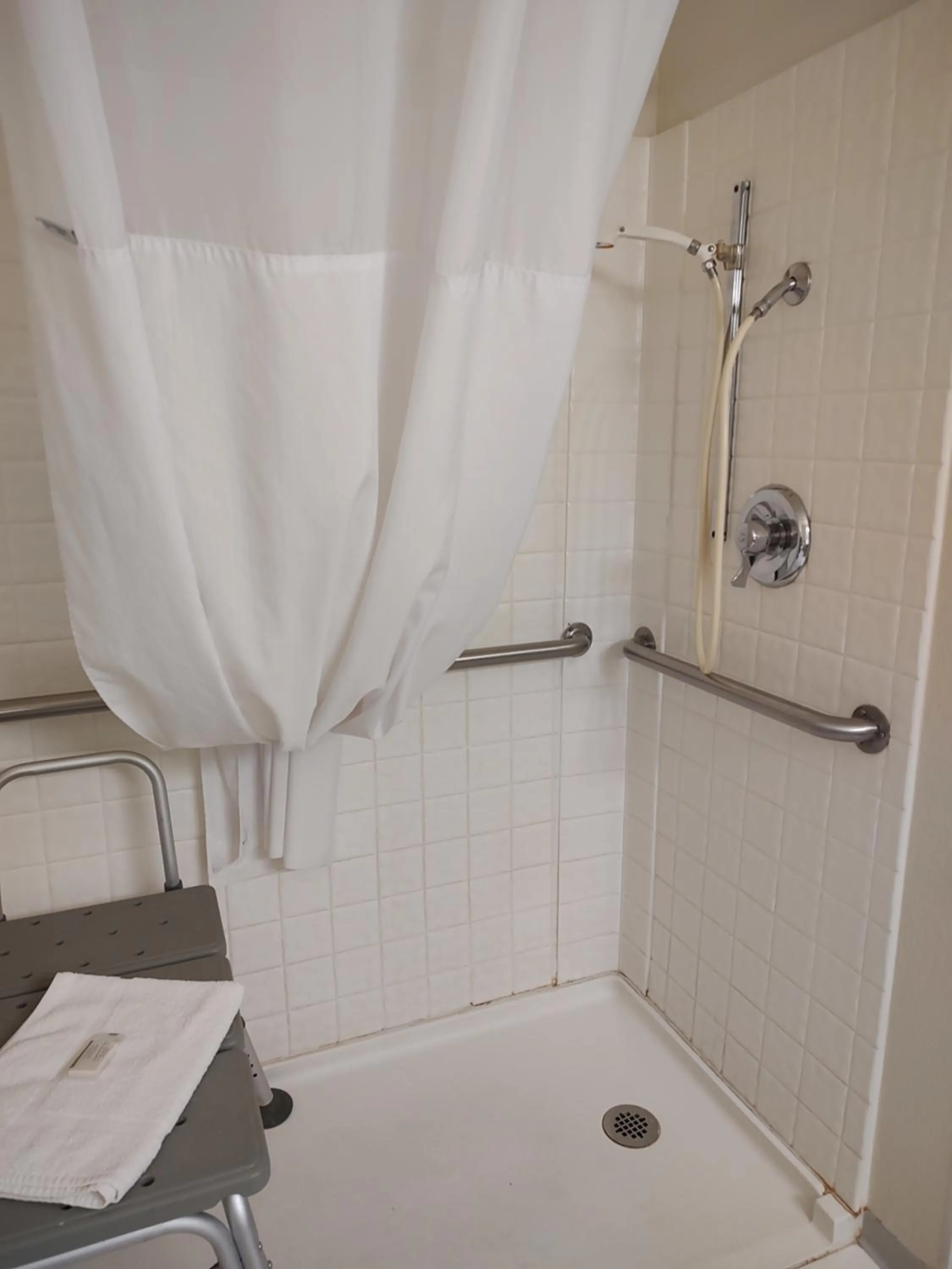 Shower in Days Inn & Suites by Wyndham Fargo 19th Ave/Airport Dome