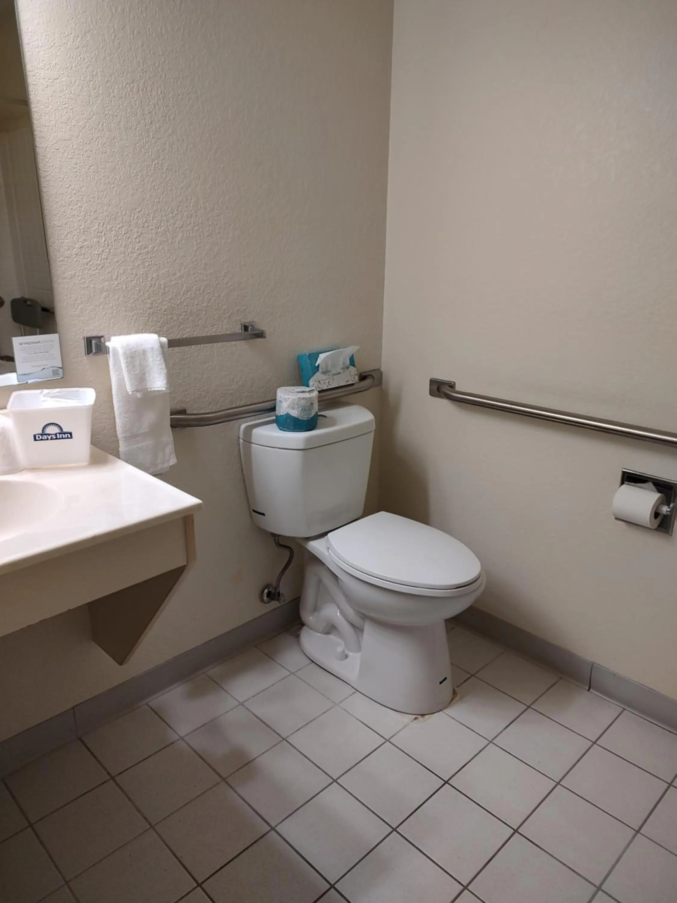 Bathroom in Days Inn & Suites by Wyndham Fargo 19th Ave/Airport Dome