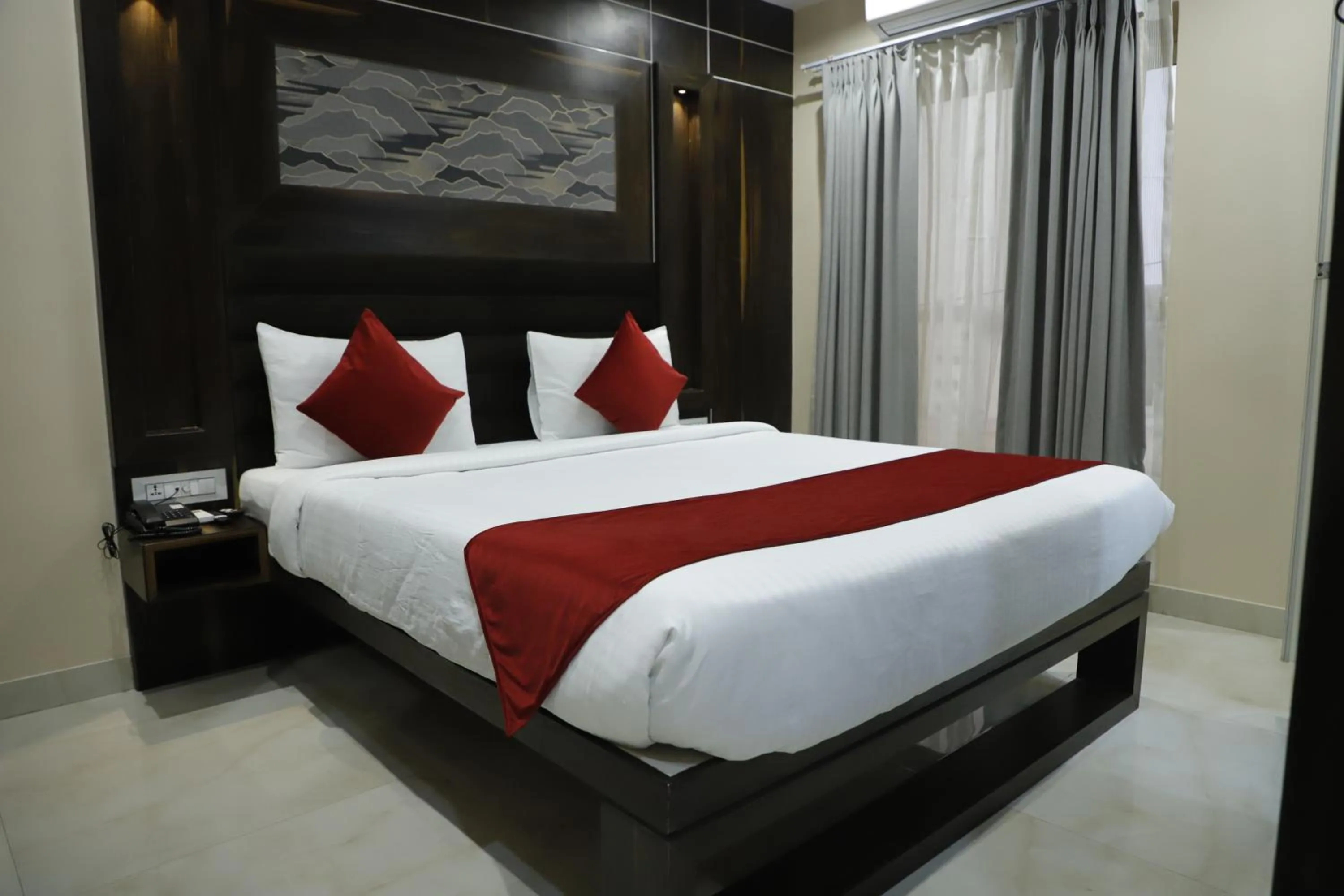 Bed in Hotel Trax International