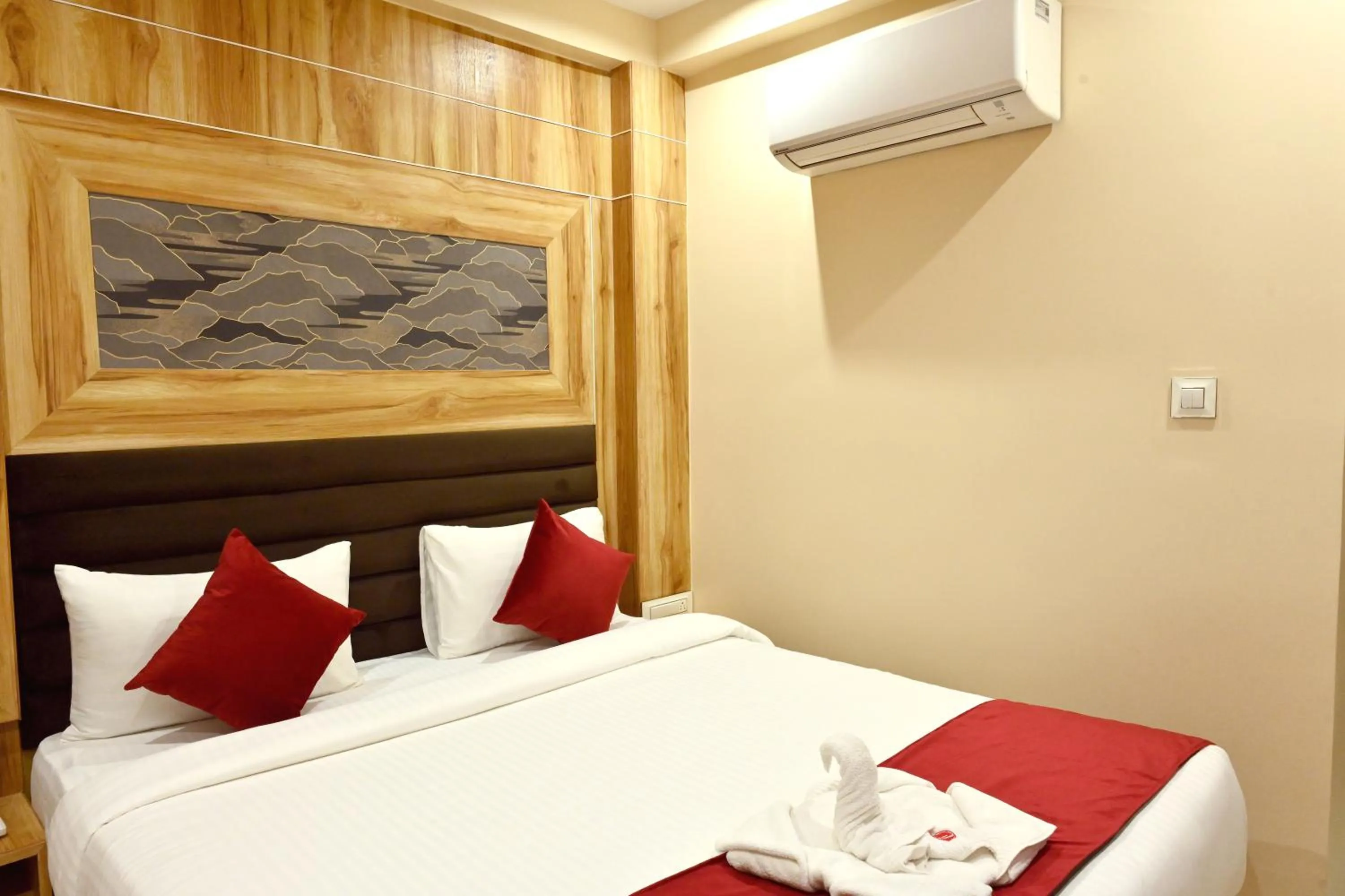 Bed in Hotel Trax International