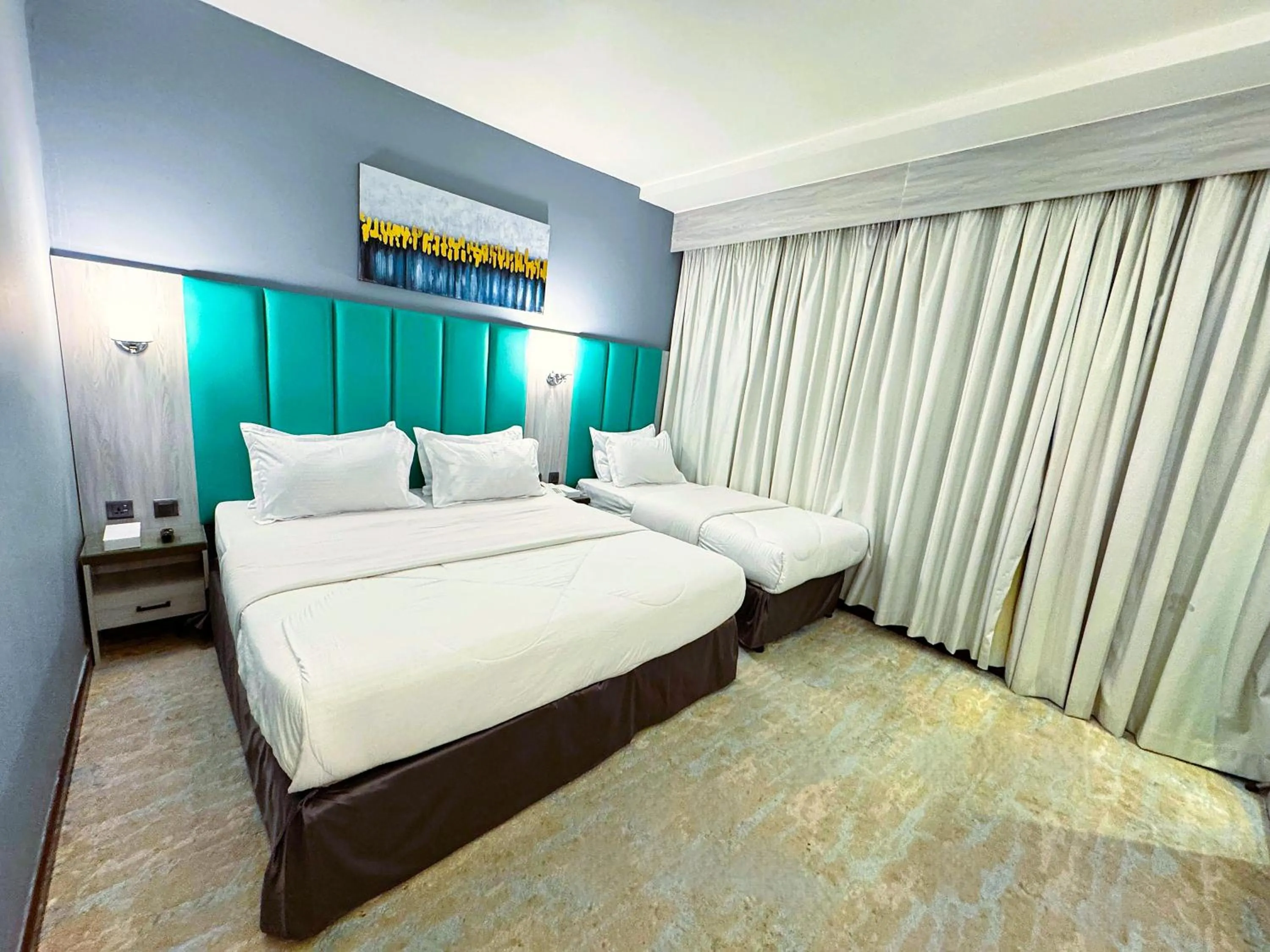 Bed in Hafez Hotel Apartments - Al Ras Metro Station