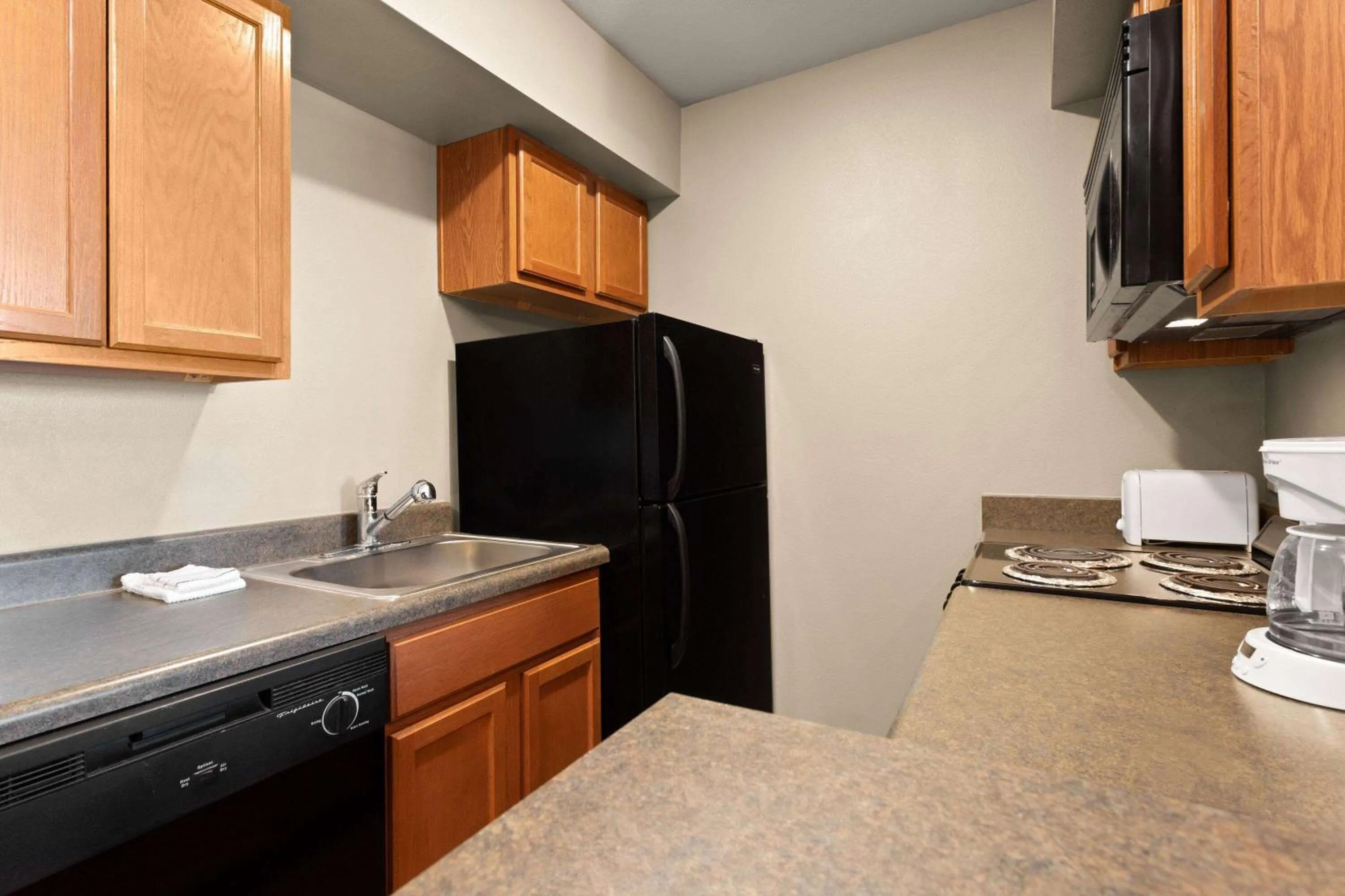 Photo of the whole room in Eagle's Den Suites Cotulla a Travelodge by Wyndham