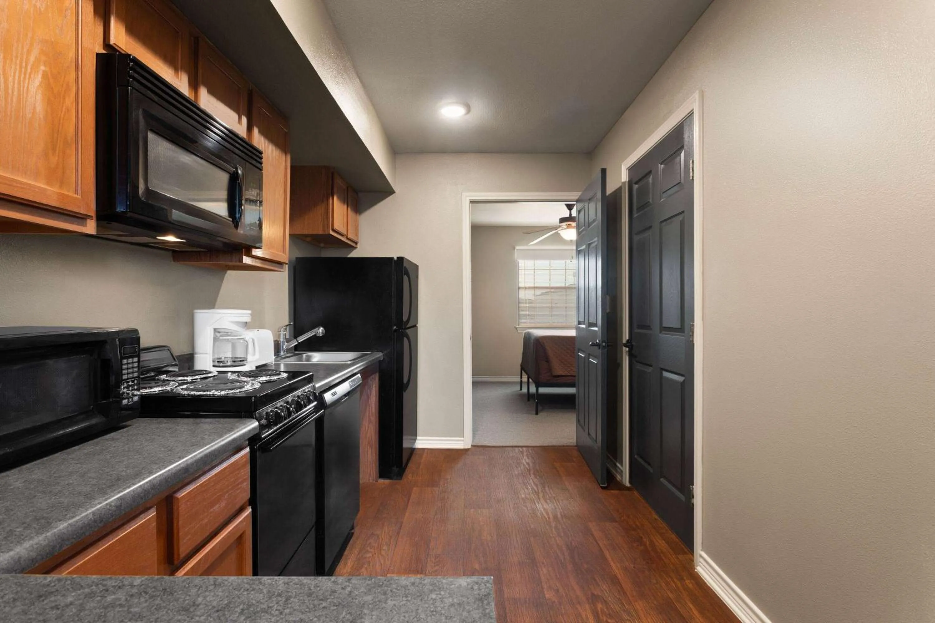 Photo of the whole room in Eagle's Den Suites Cotulla a Travelodge by Wyndham