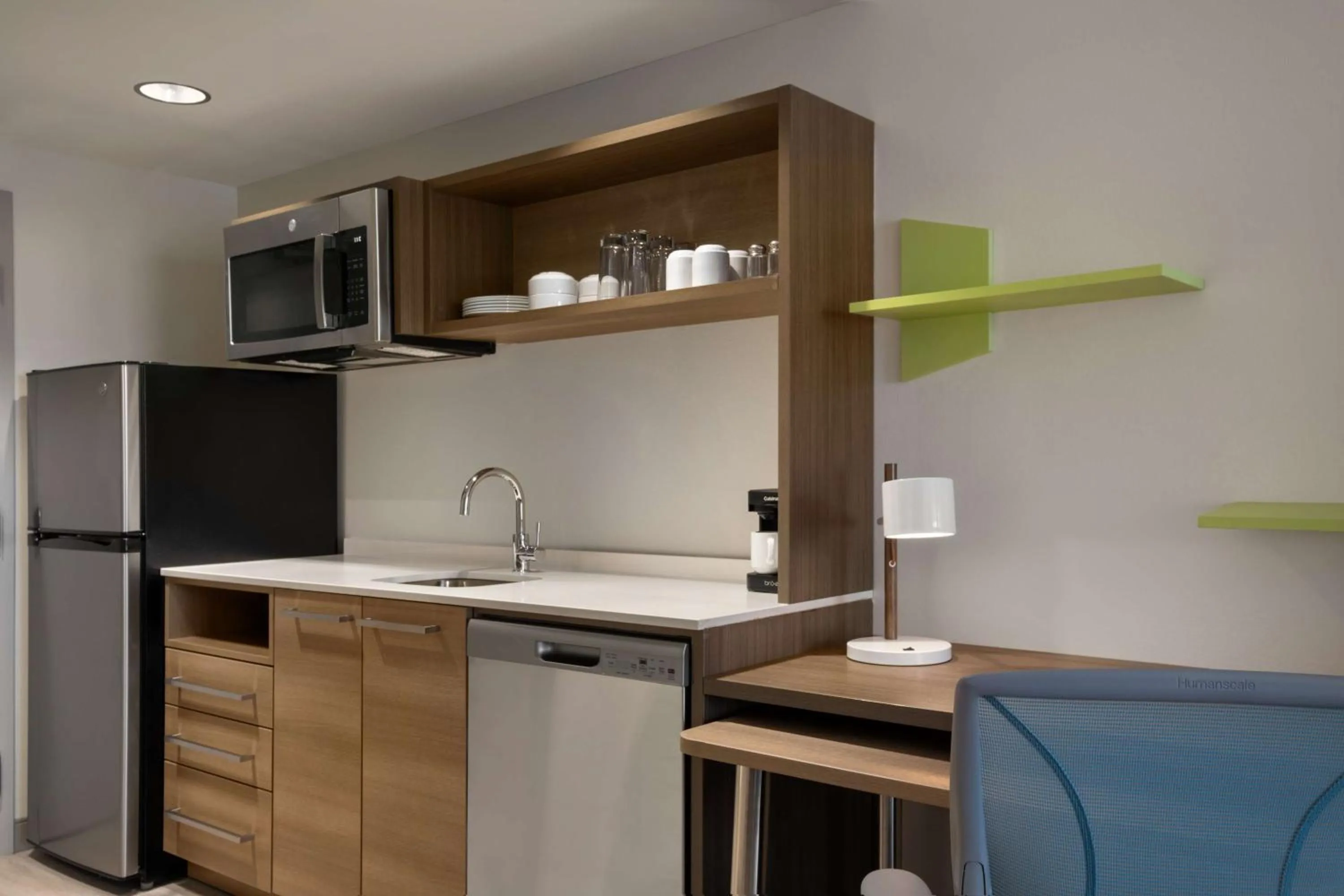 Kitchen or kitchenette in Home2 Suites By Hilton East Austin - near Downtown and UT