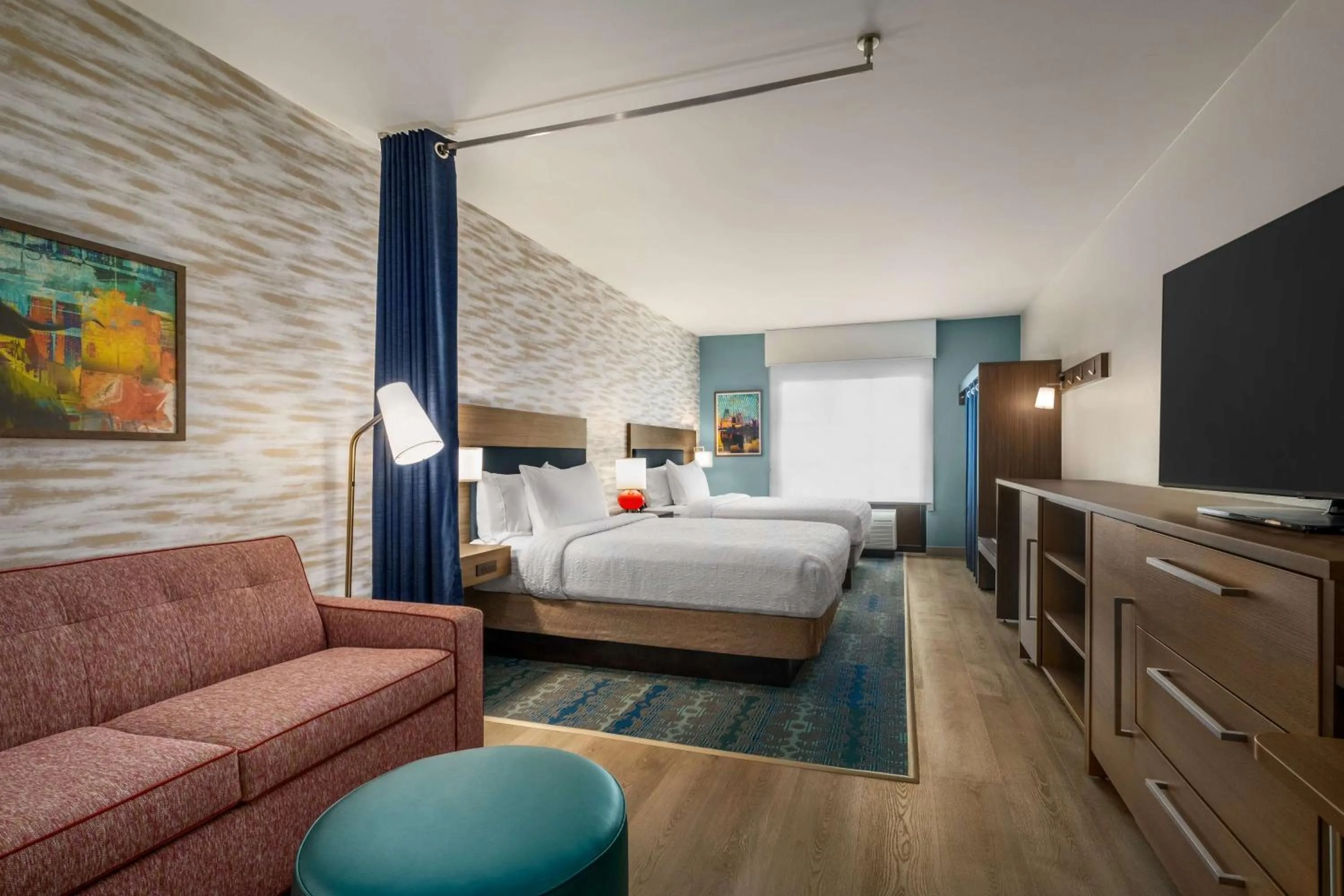 Living room, Bed in Home2 Suites By Hilton East Austin - near Downtown and UT