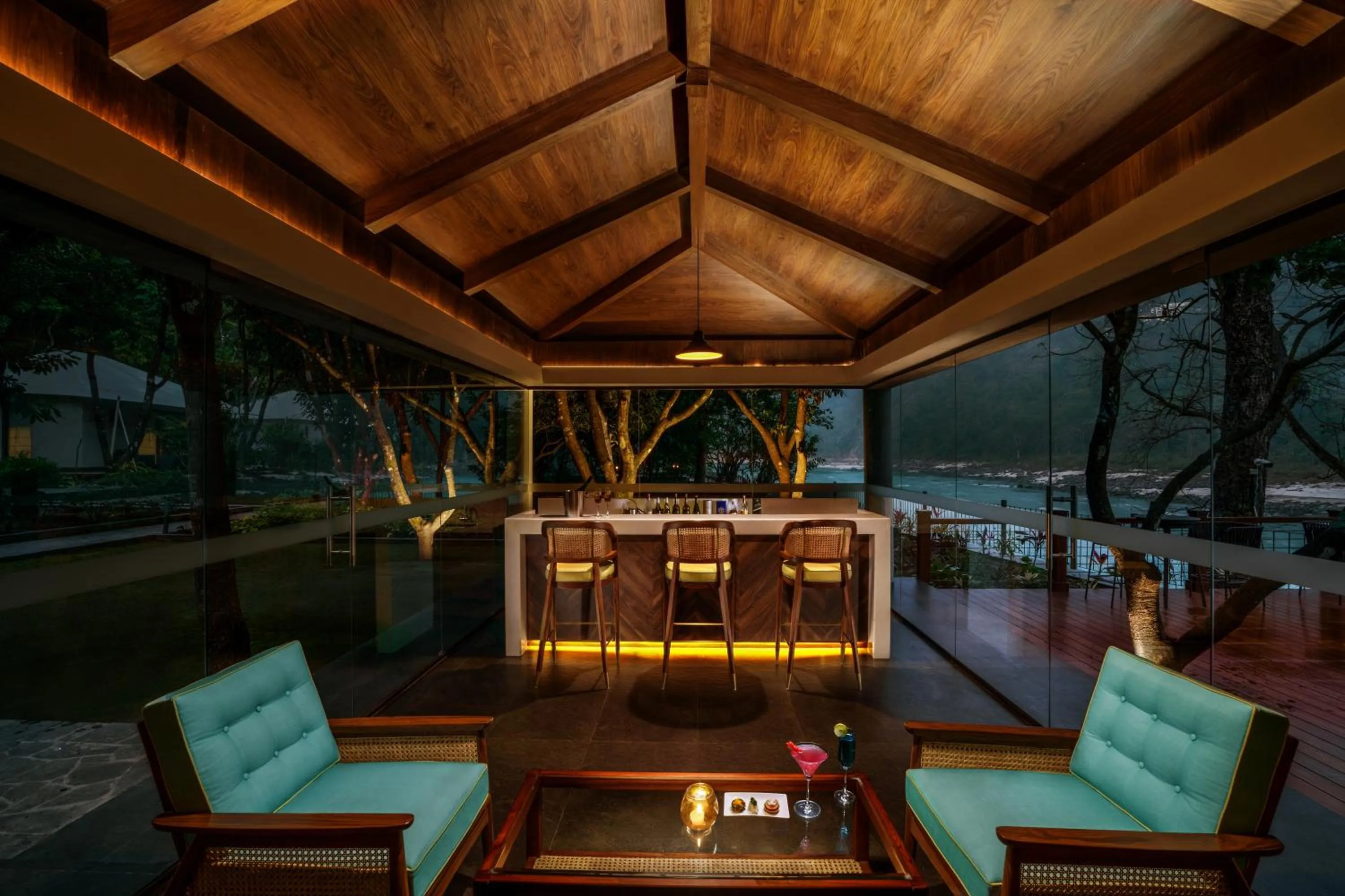 Seating area in Anand Kashi by the Ganges Rishikesh - IHCL Seleqtions