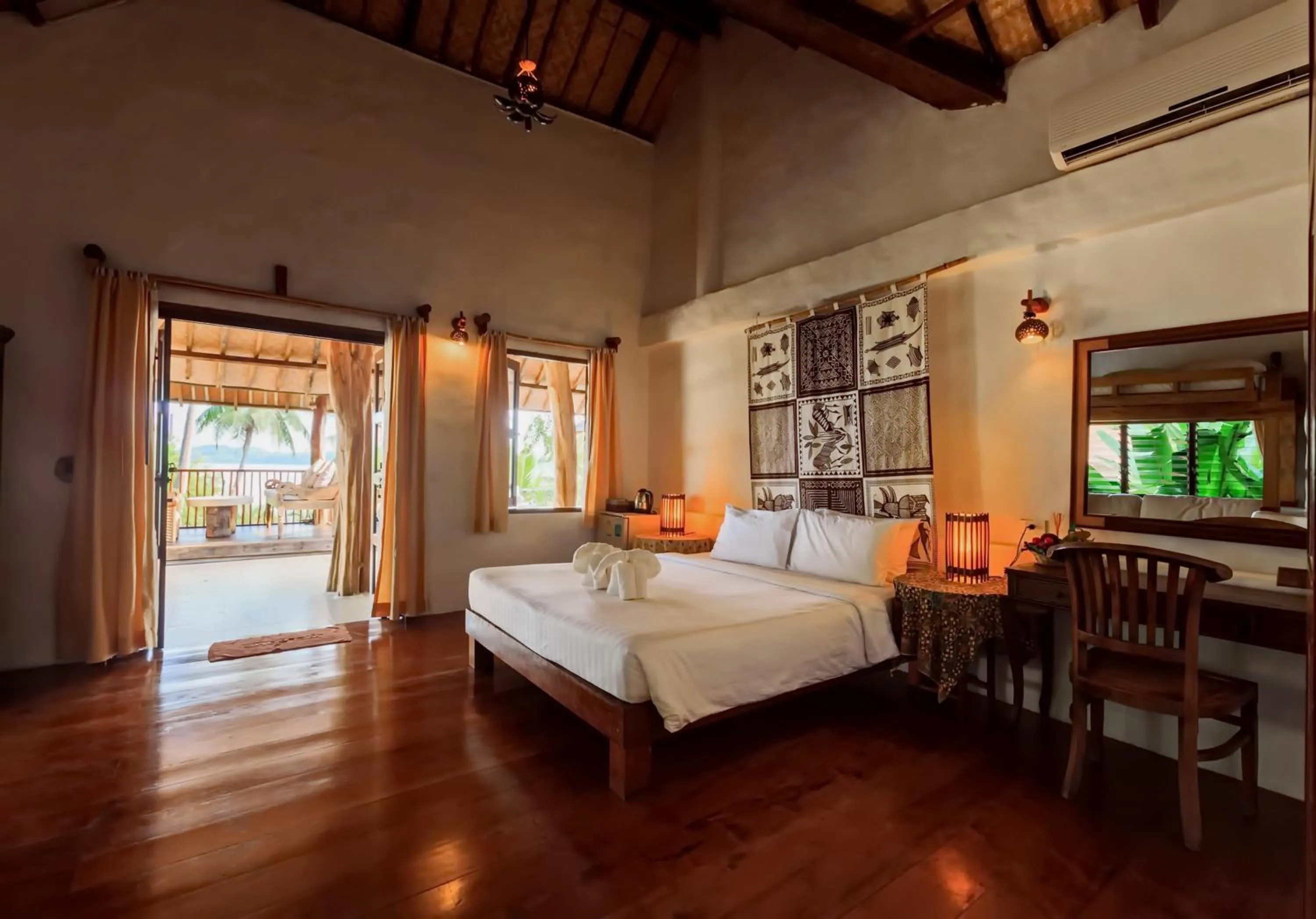 Bed in Koh Mak Cococape Resort