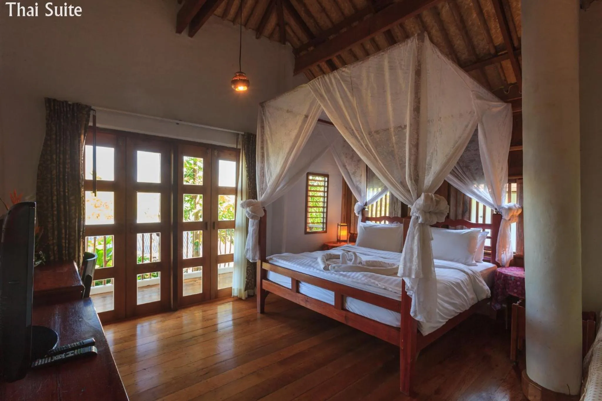 Bed in Koh Mak Cococape Resort