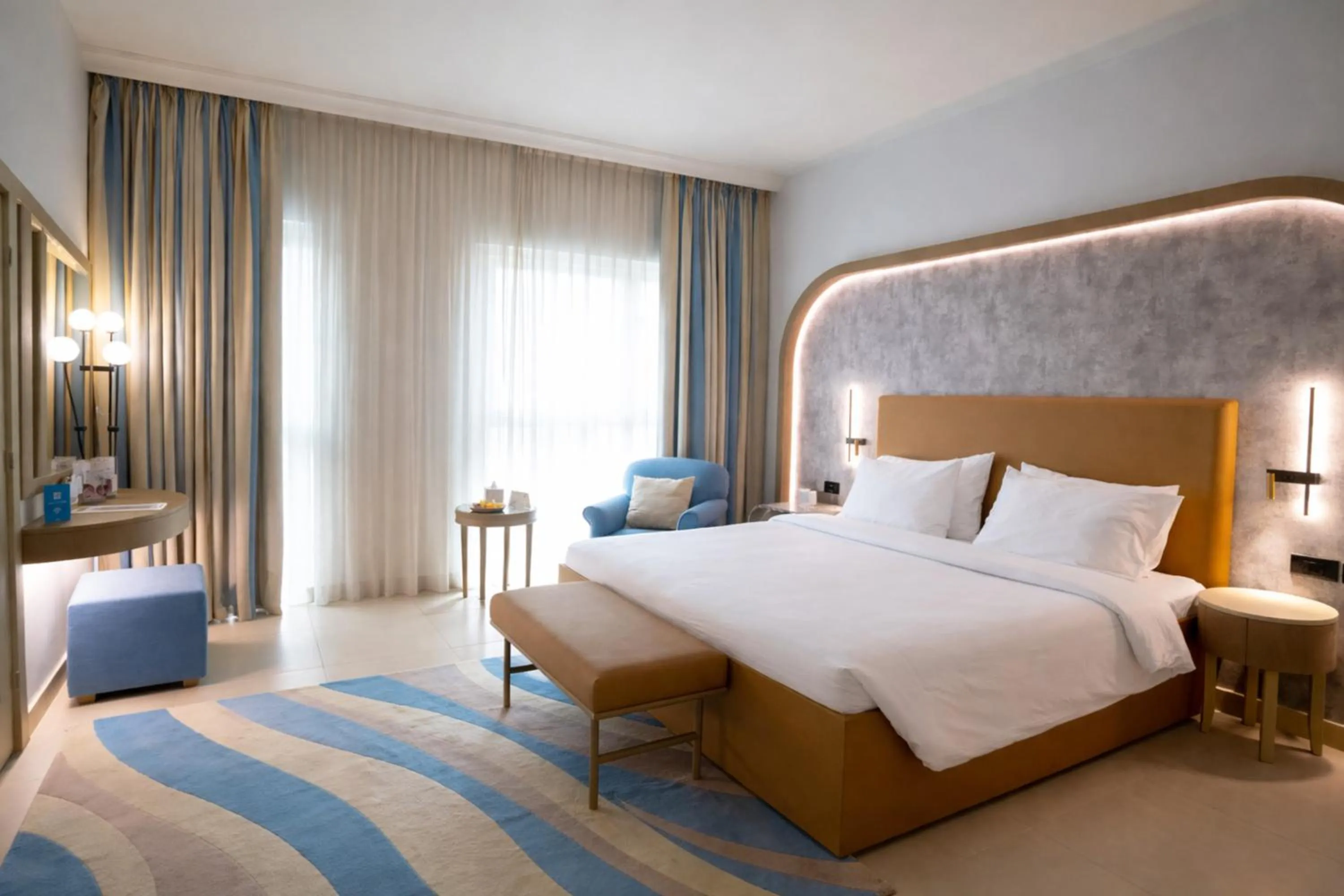 Bed in Sheraton Khalidiya Hotel