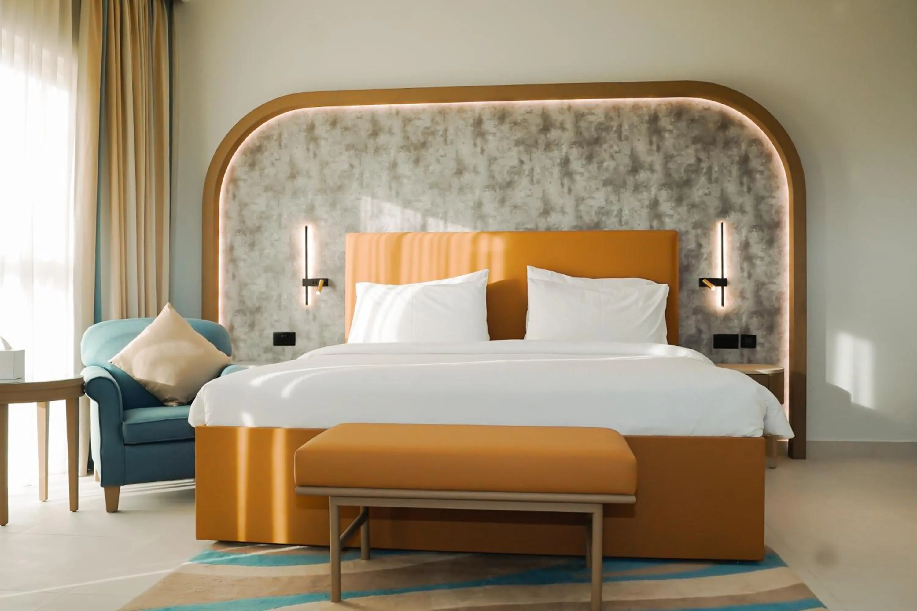 Bed in Sheraton Khalidiya Hotel