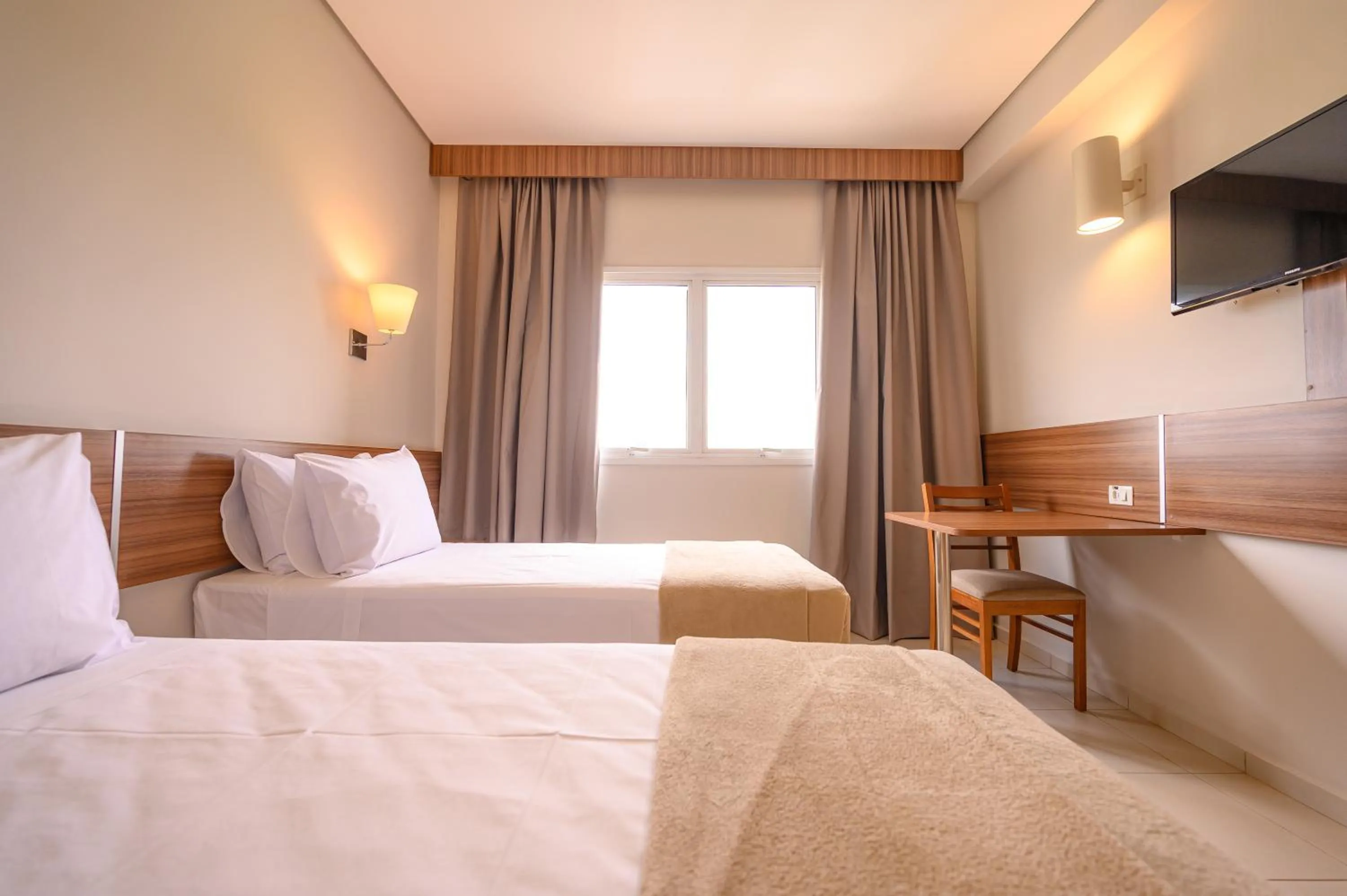 Bed in UniHotel Salto