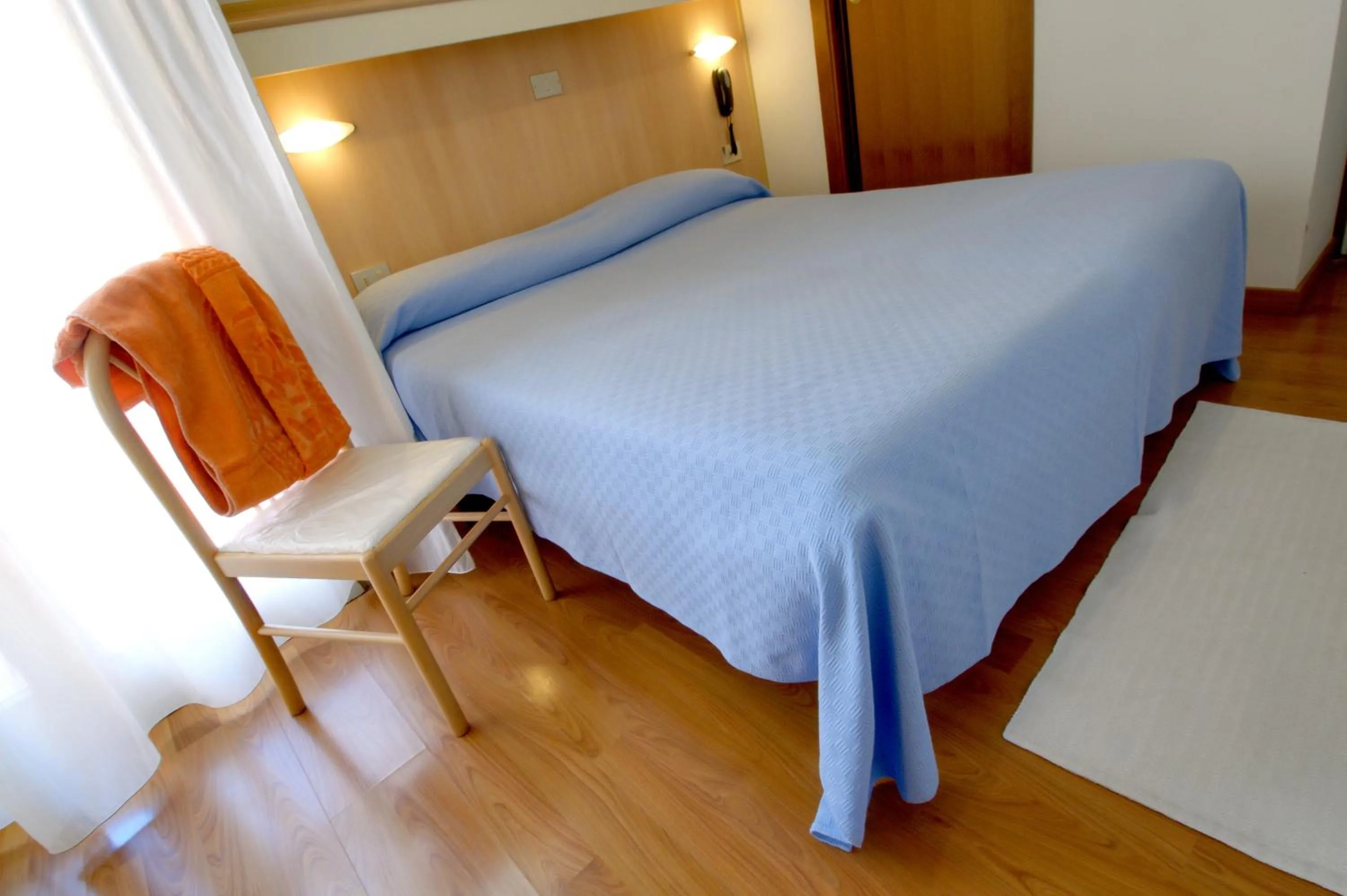 Bed in Hotel Telenia