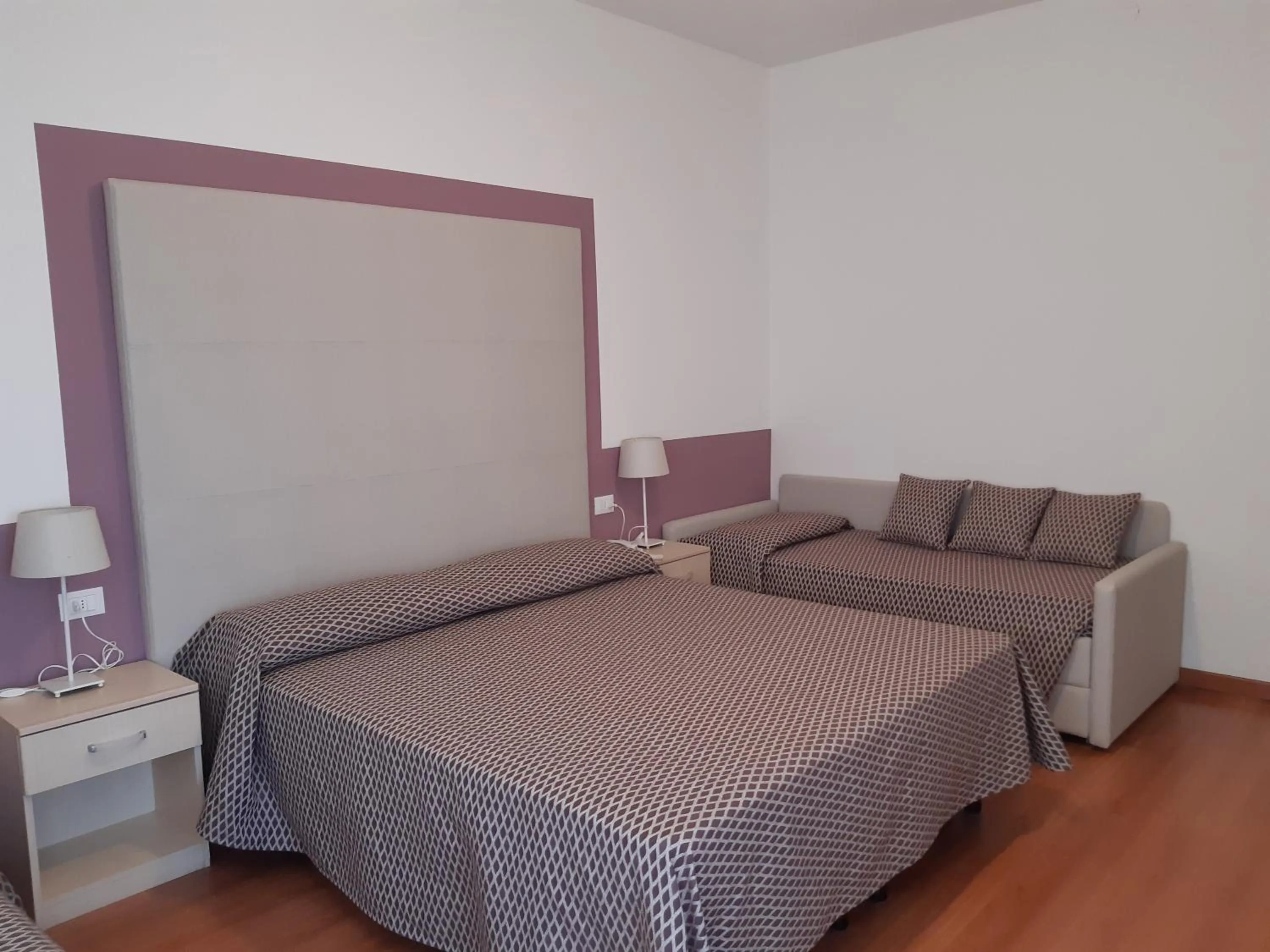 Bed in Hotel Telenia