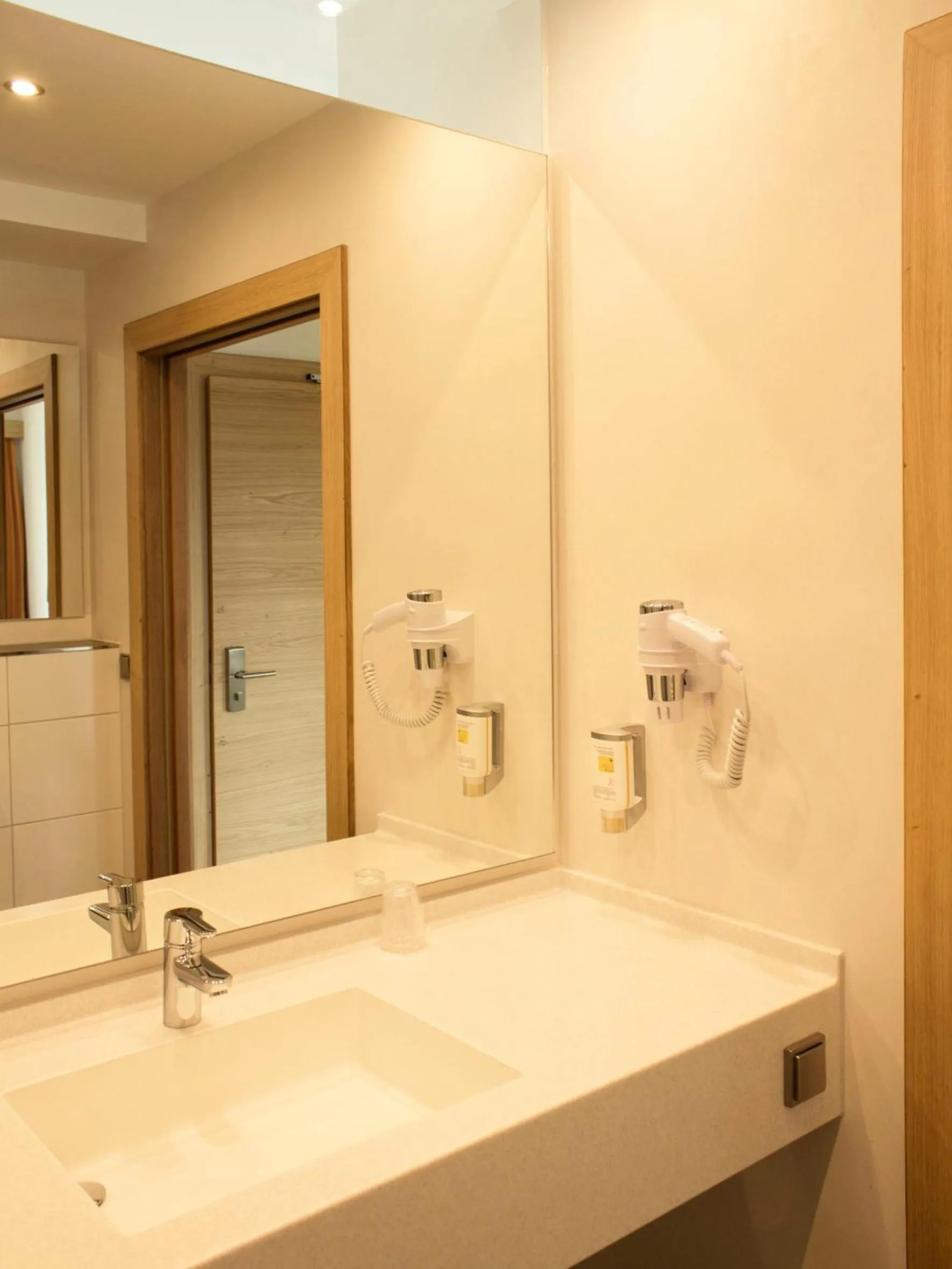 Bathroom in Alpenflair Hotel