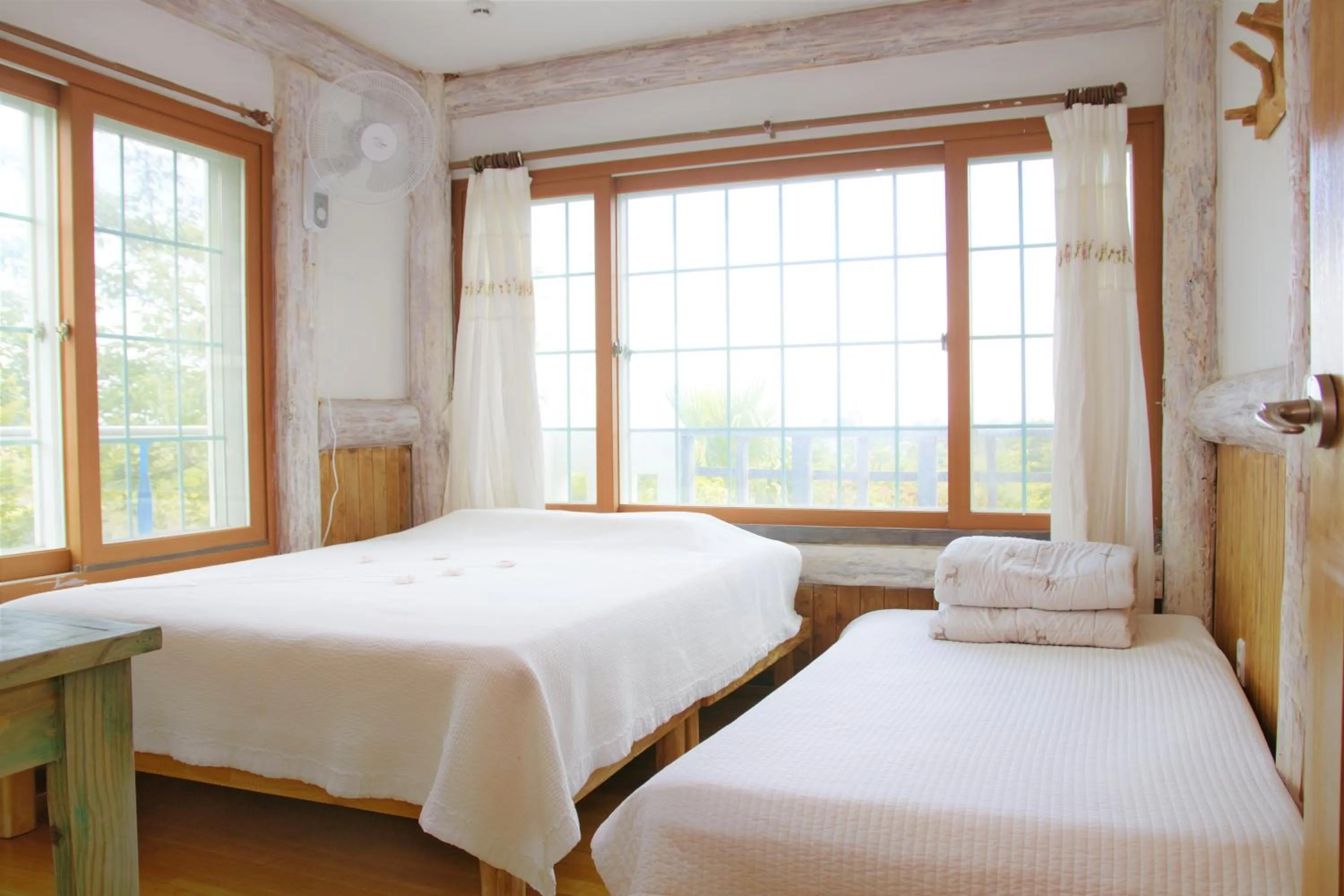 Bed in Seogwipo Beautiful Resort